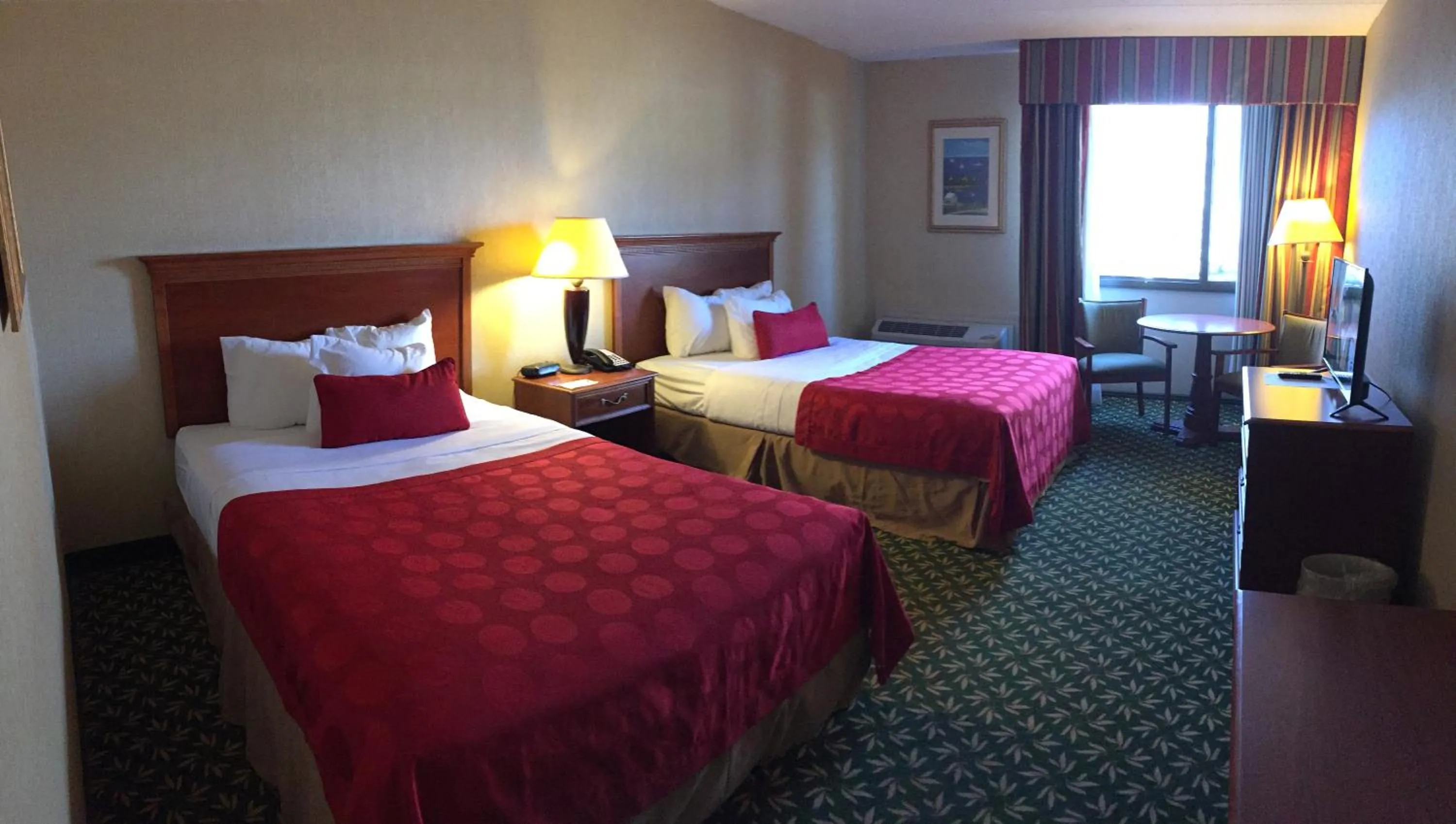 Bed in Mystic River Hotel & Suites