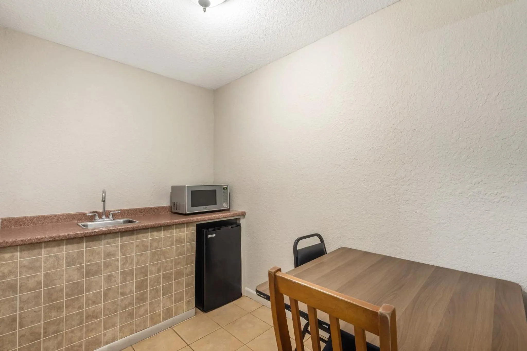 Photo of the whole room in Red Roof Inn Ft Pierce