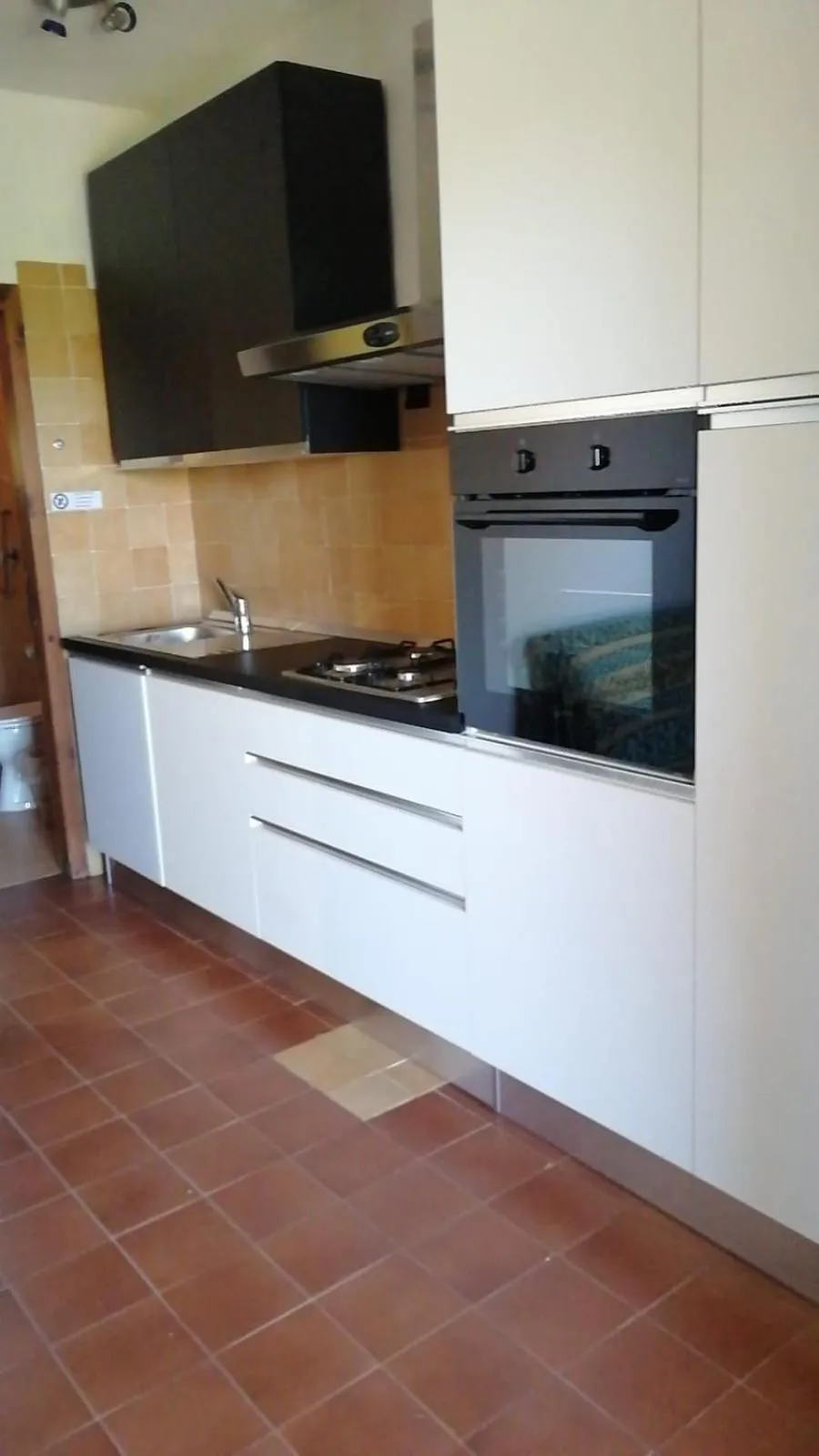 Kitchen or kitchenette in Porto Ottiolu Resort