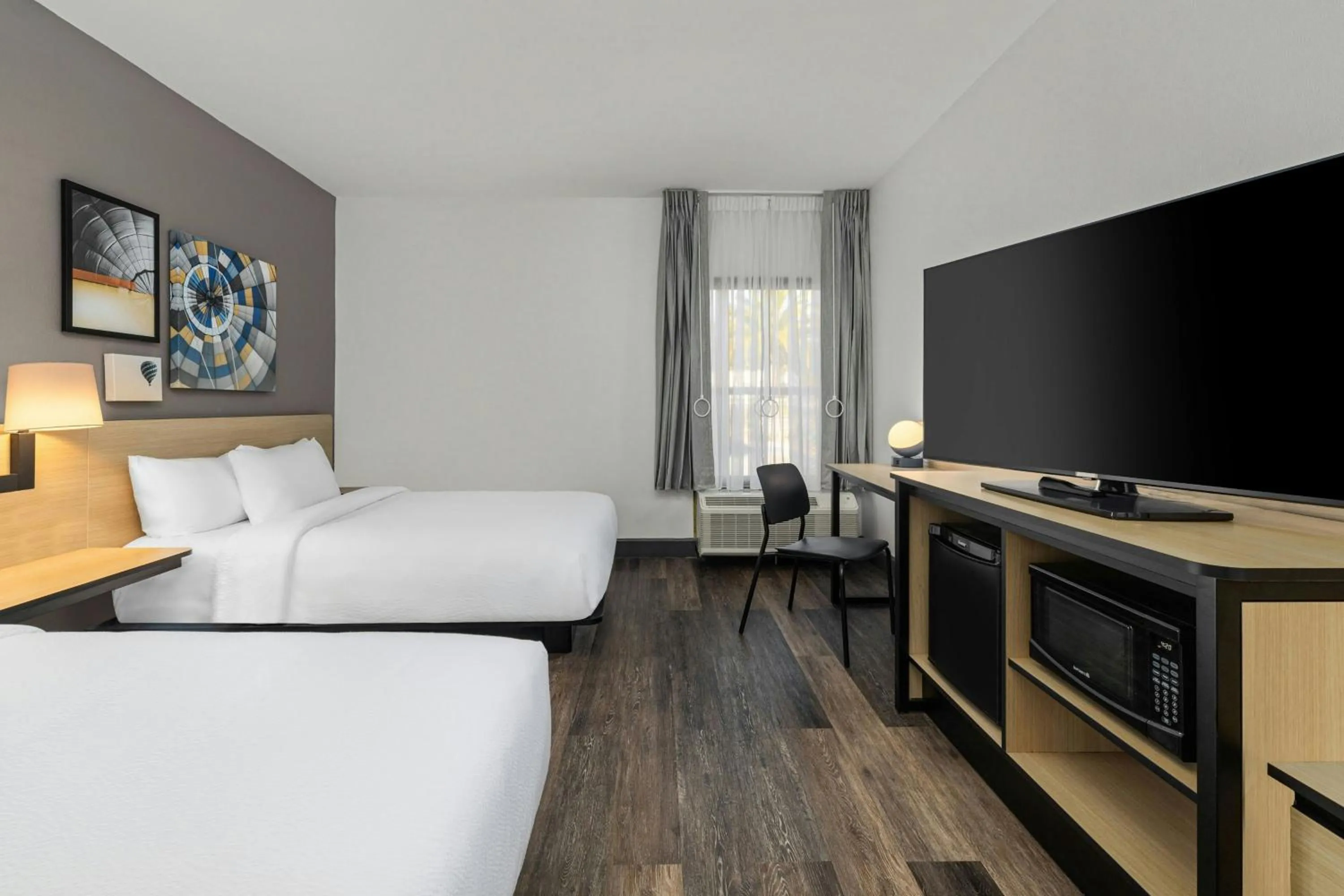 Photo of the whole room, Bed in City Express by Marriott Yulee