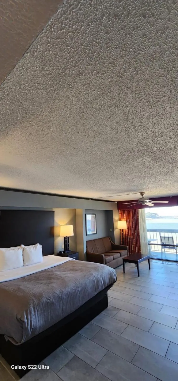 Bed in Quality Inn & Suites Gulf Breeze Bayside near Pensacola Beach