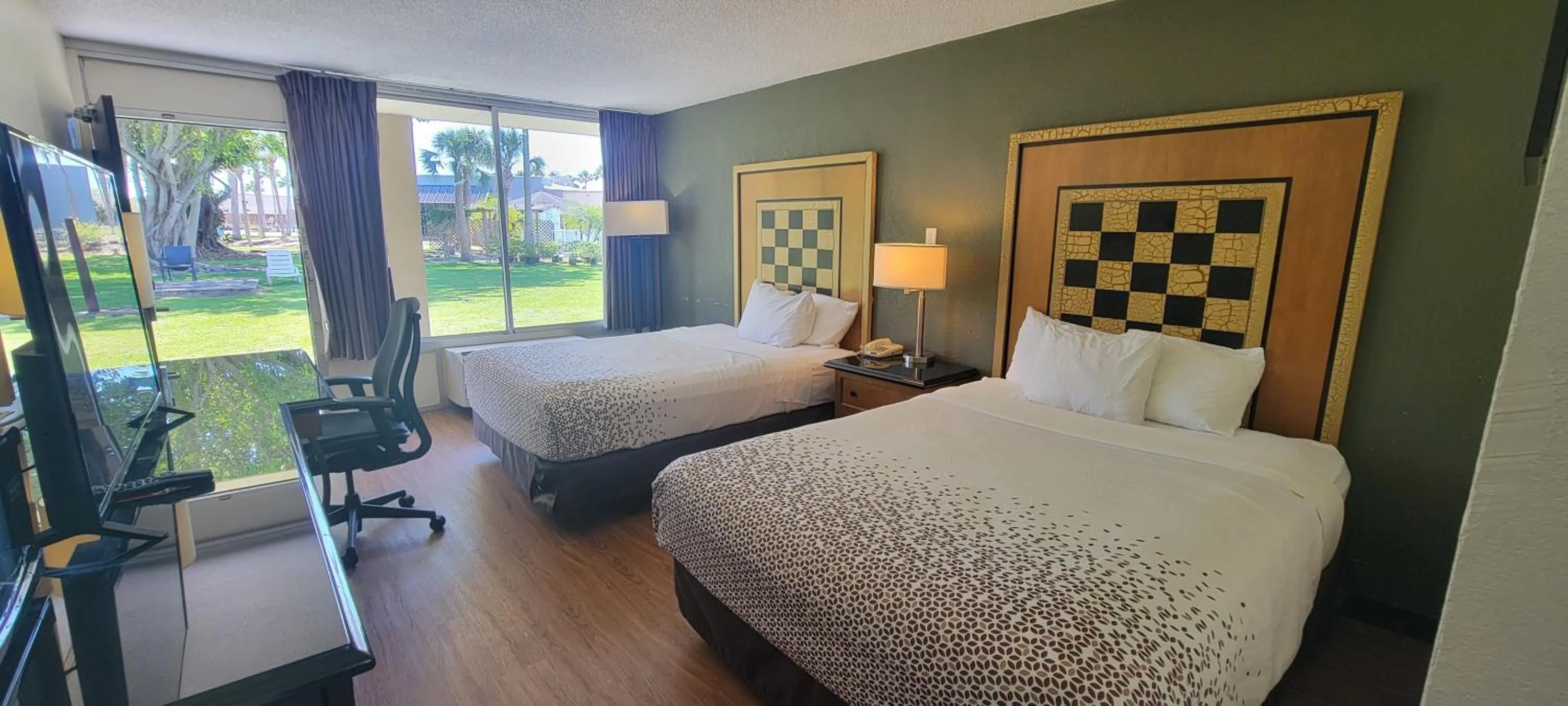 Bed in ISLAND HOTEL of Space Coast