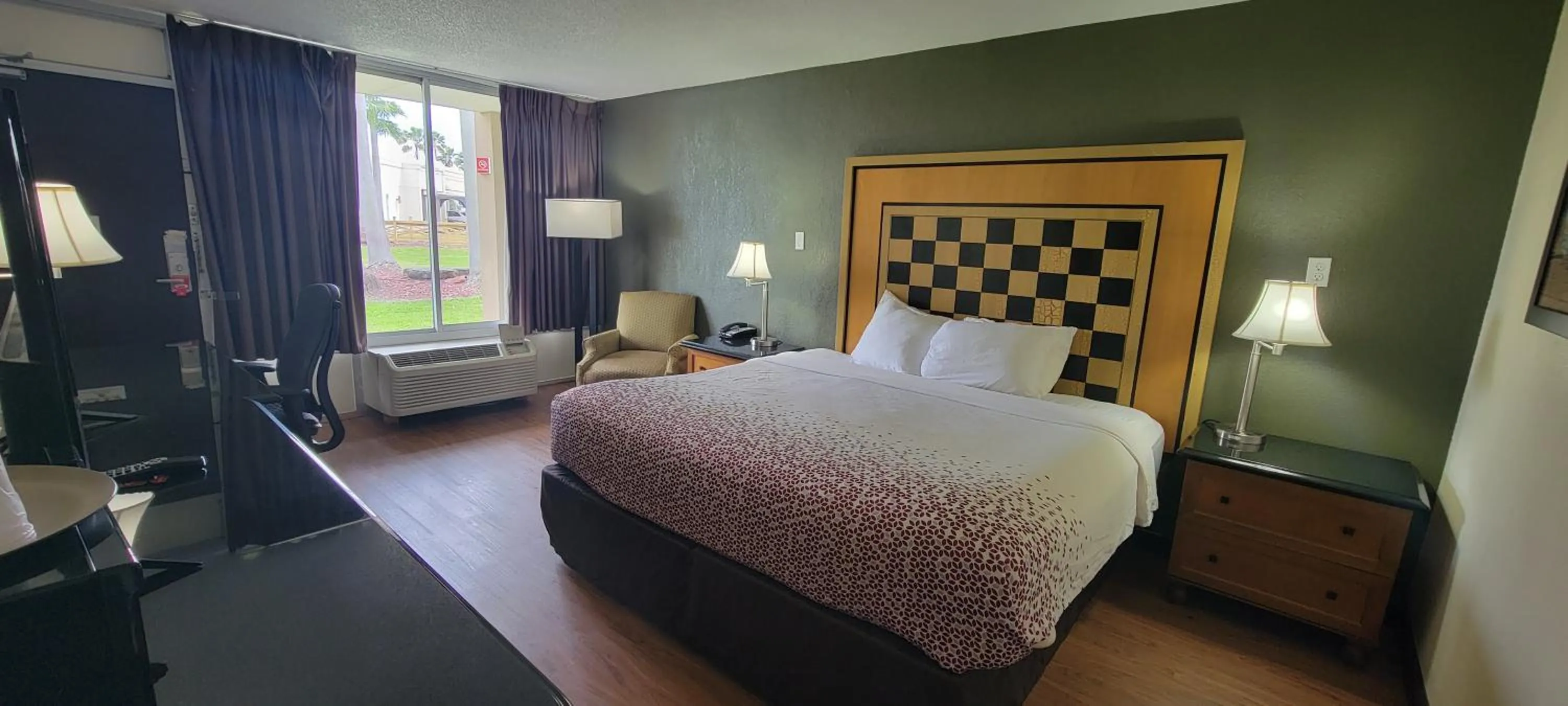 Bed in ISLAND HOTEL of Space Coast