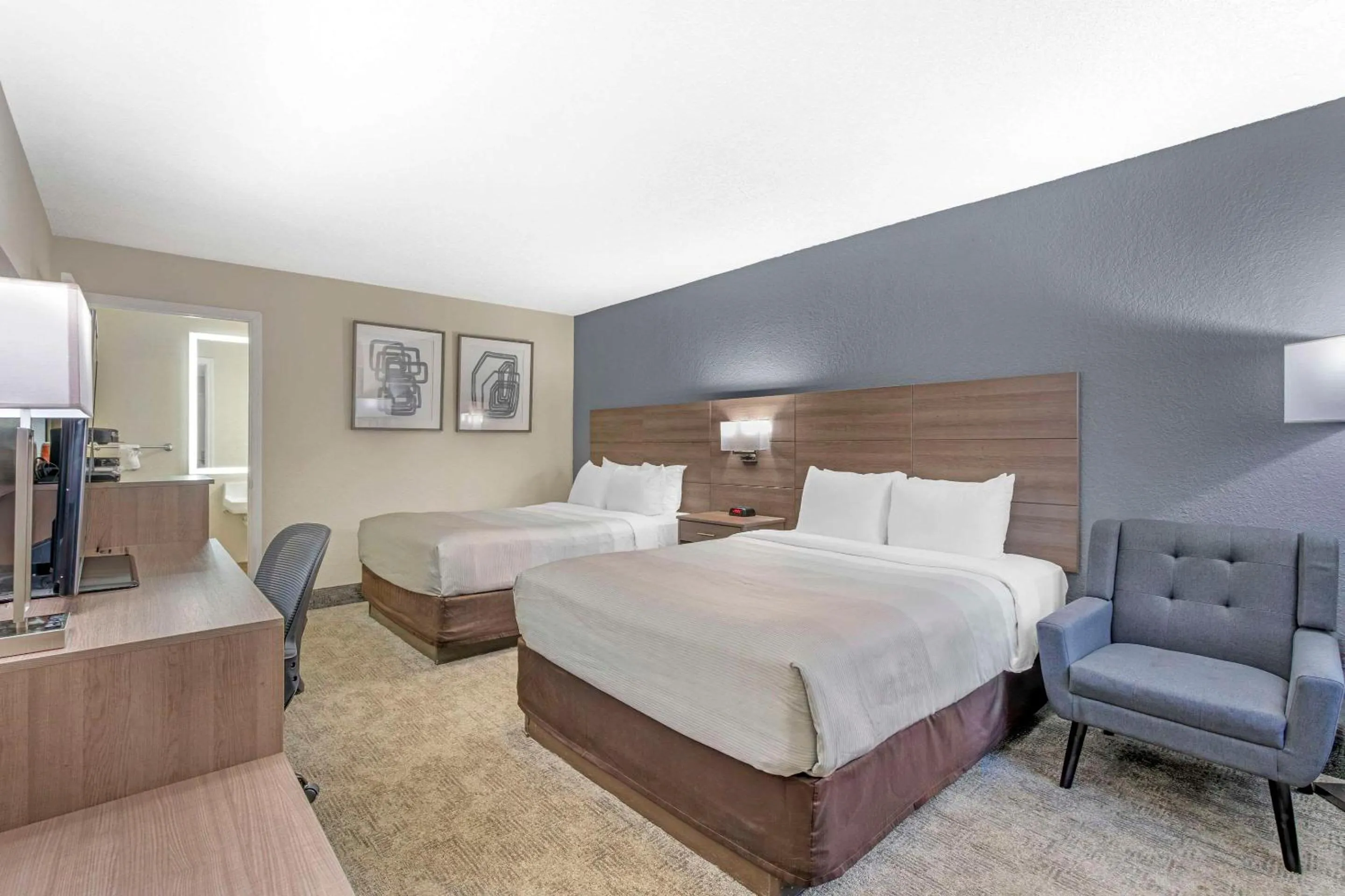 Bedroom, Bed in Quality Inn Daytona Speedway - I-95