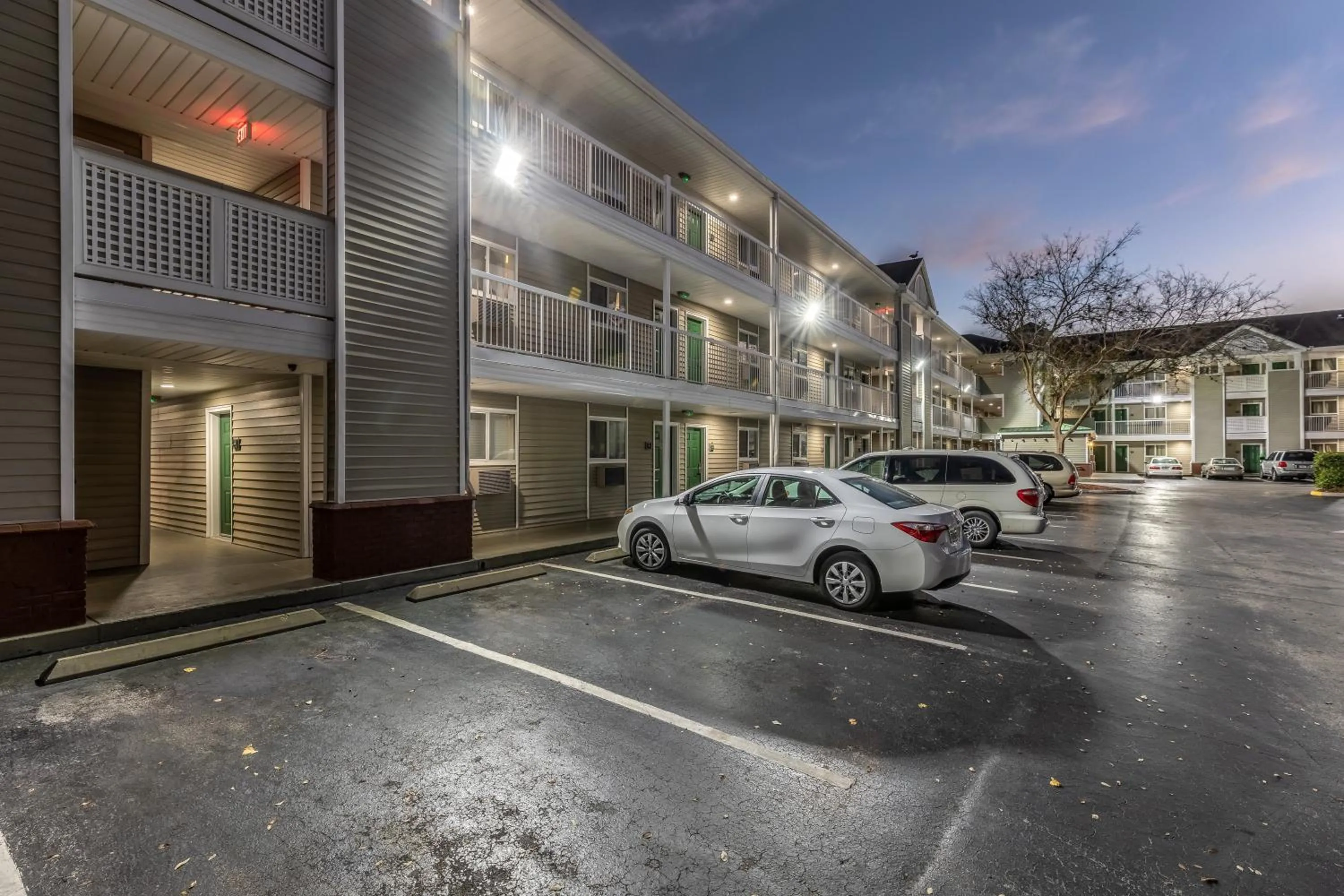 Property building in HomeTowne Studios by Red Roof Orlando - Casselberry