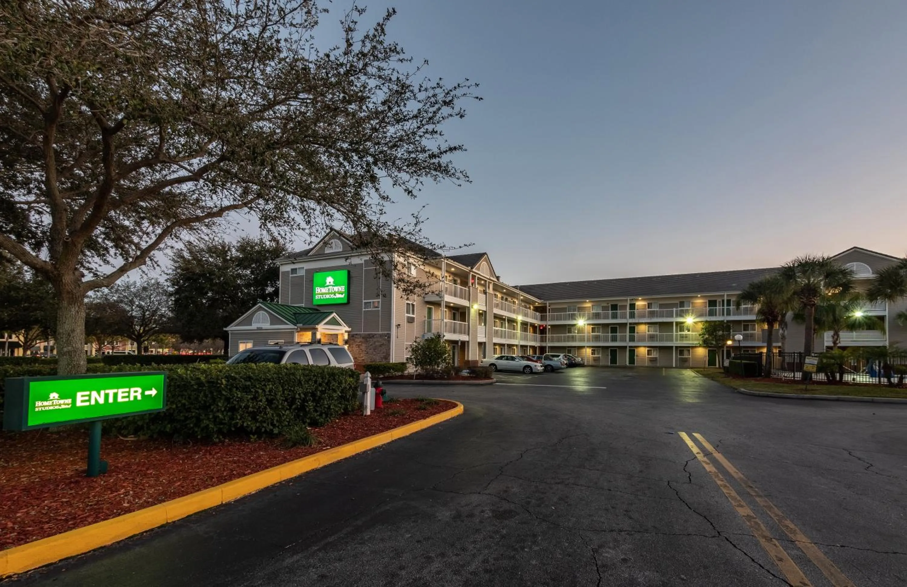 Property building in HomeTowne Studios by Red Roof Orlando South