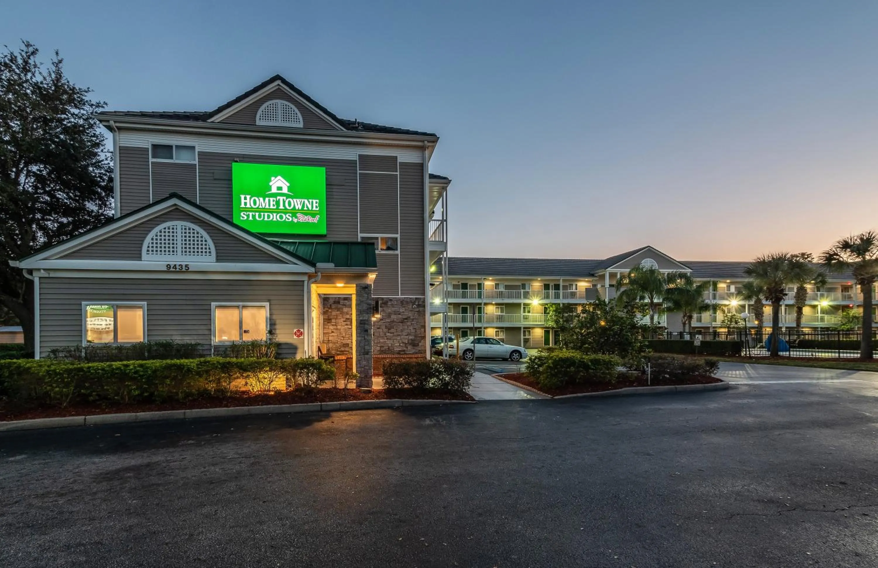 Property building in HomeTowne Studios by Red Roof Orlando South