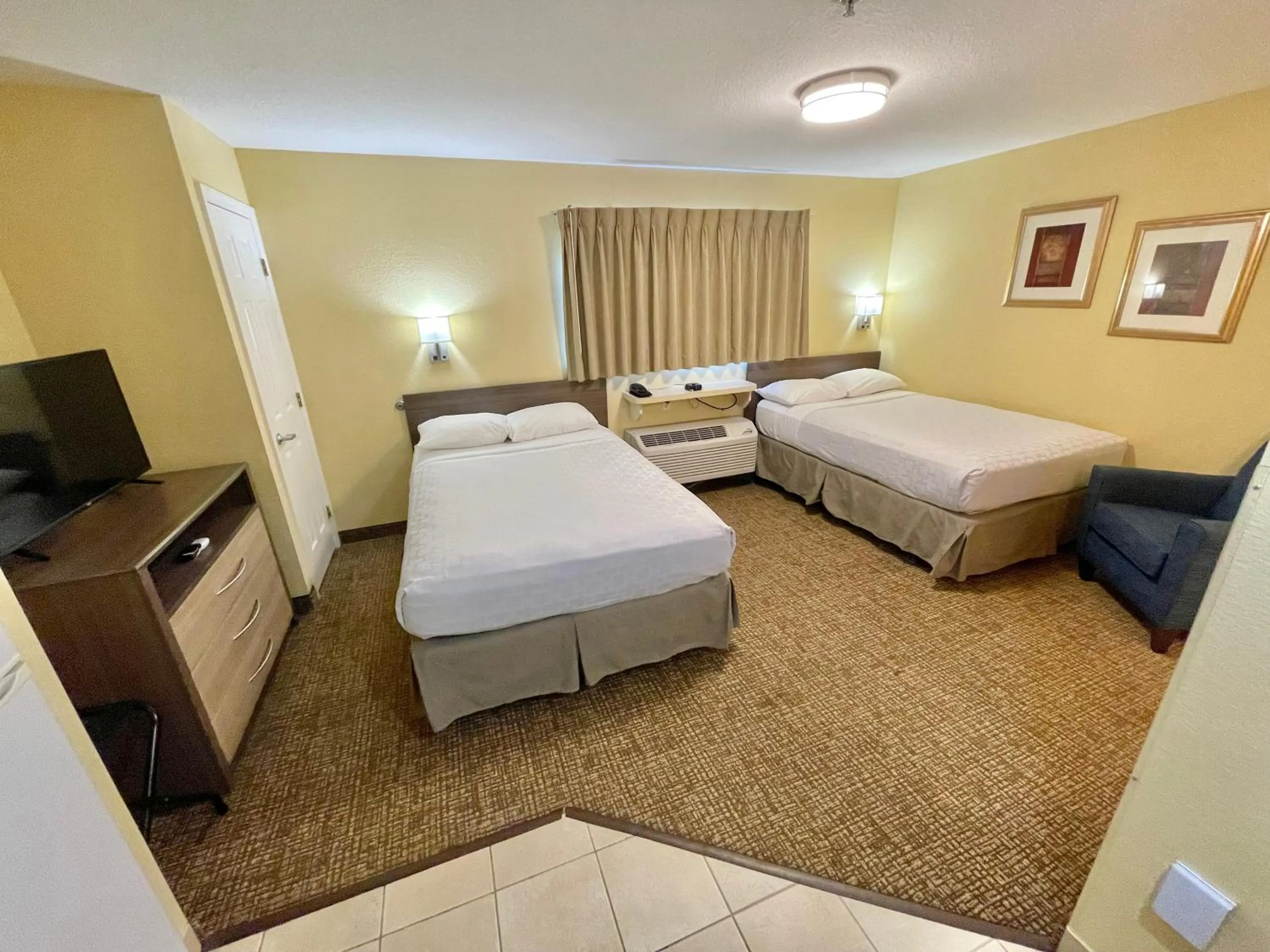 Bed in Suburban Studios Fort Myers Cape Coral
