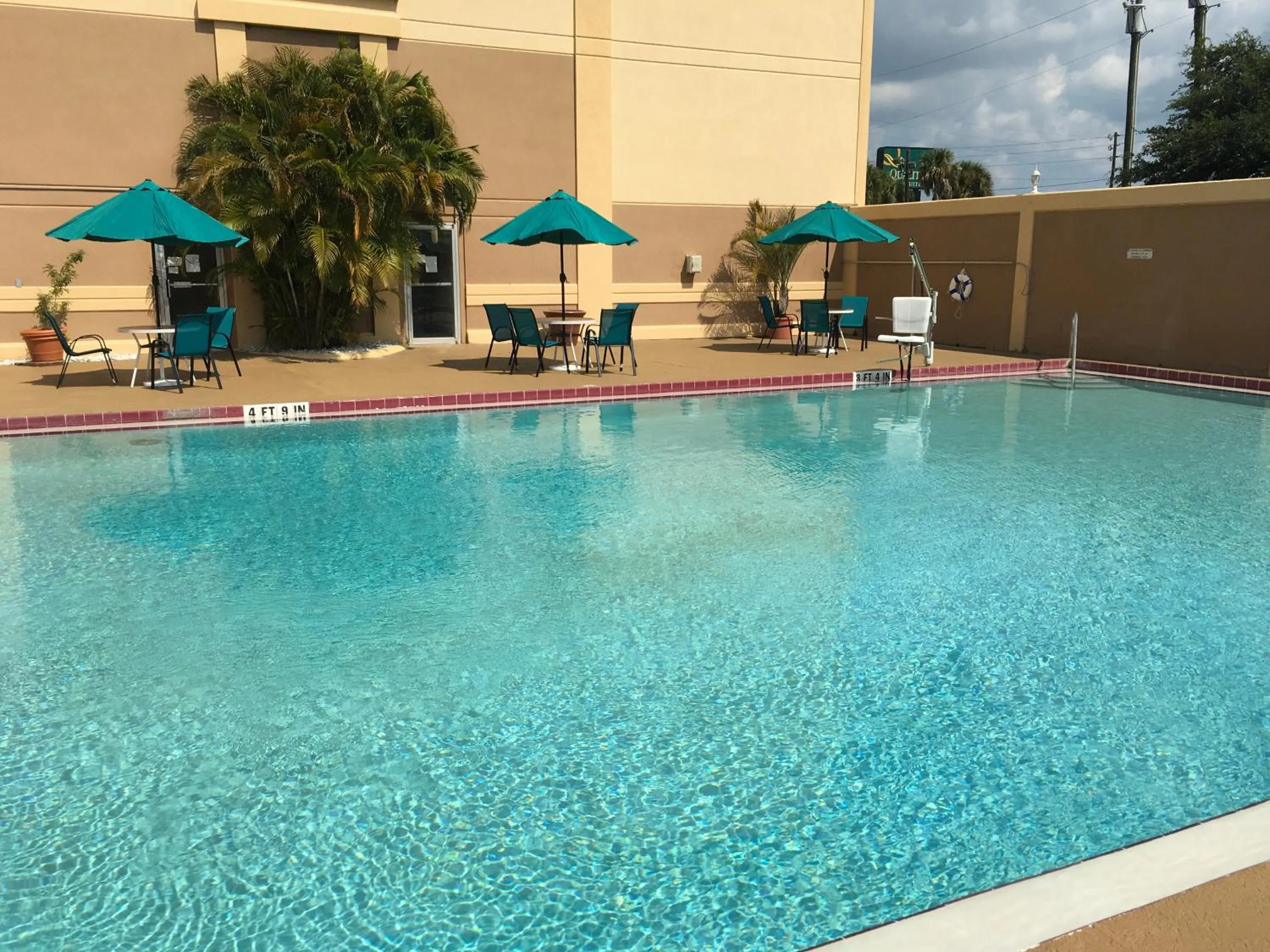 Swimming pool in Quality Inn & Suites Winter Park Village Area
