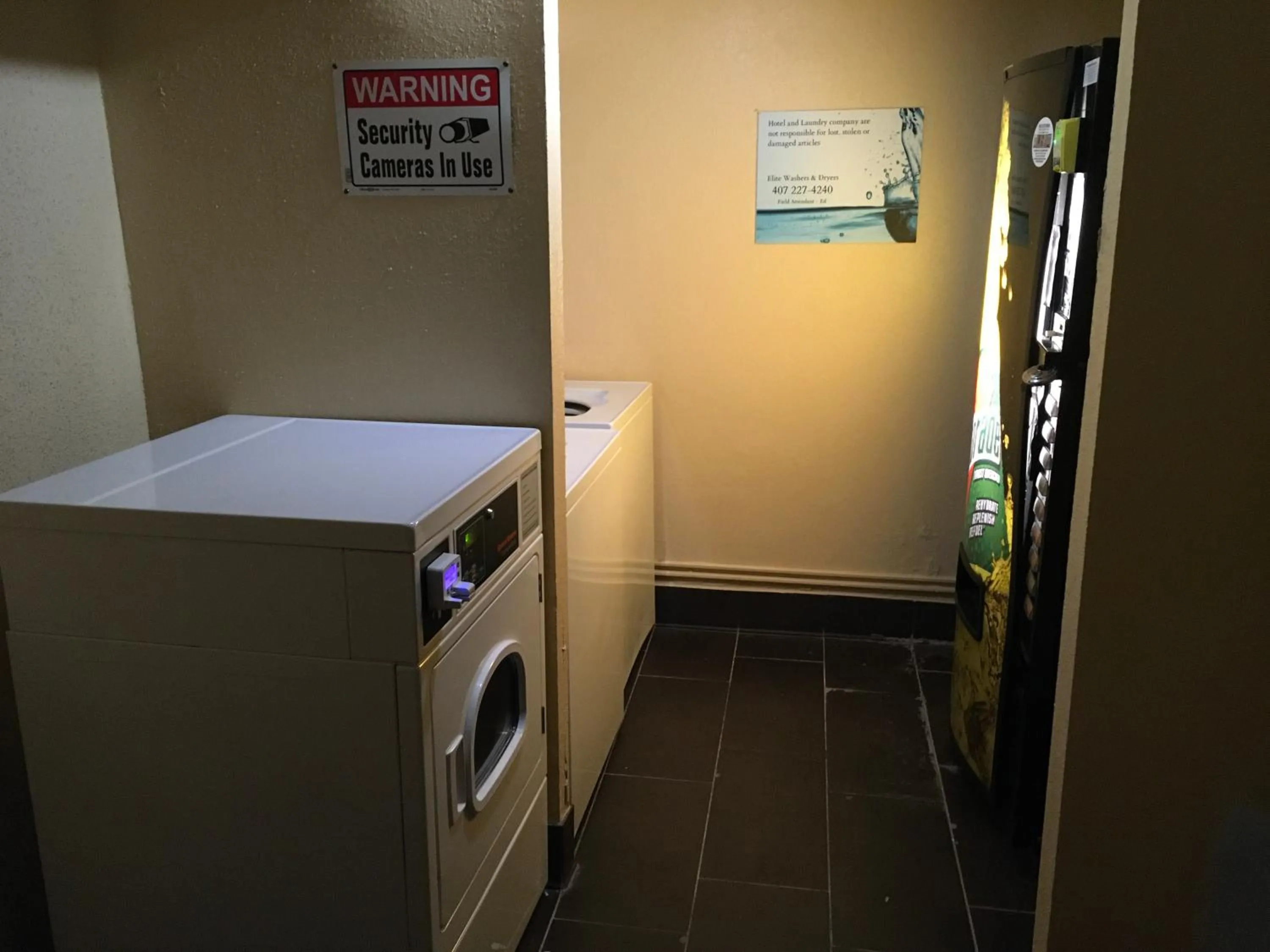 laundry in Quality Inn & Suites Winter Park Village Area