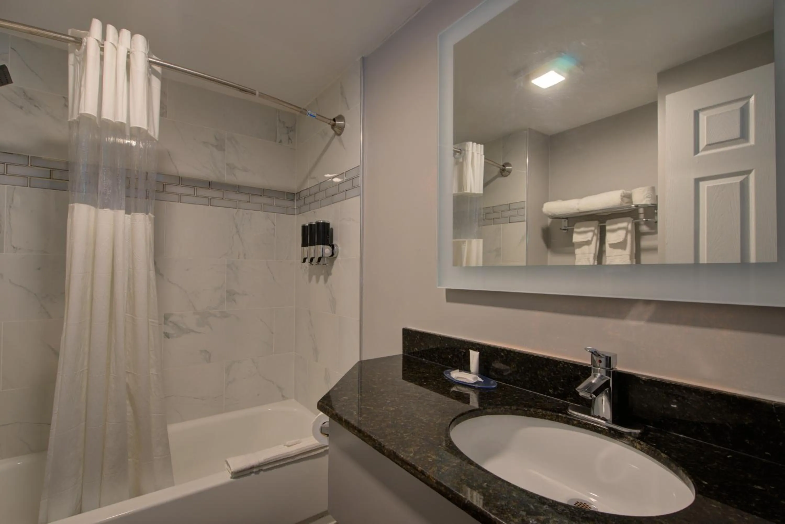 Bathroom in Clarion Pointe Tampa-Brandon Near Fairgrounds and Casino