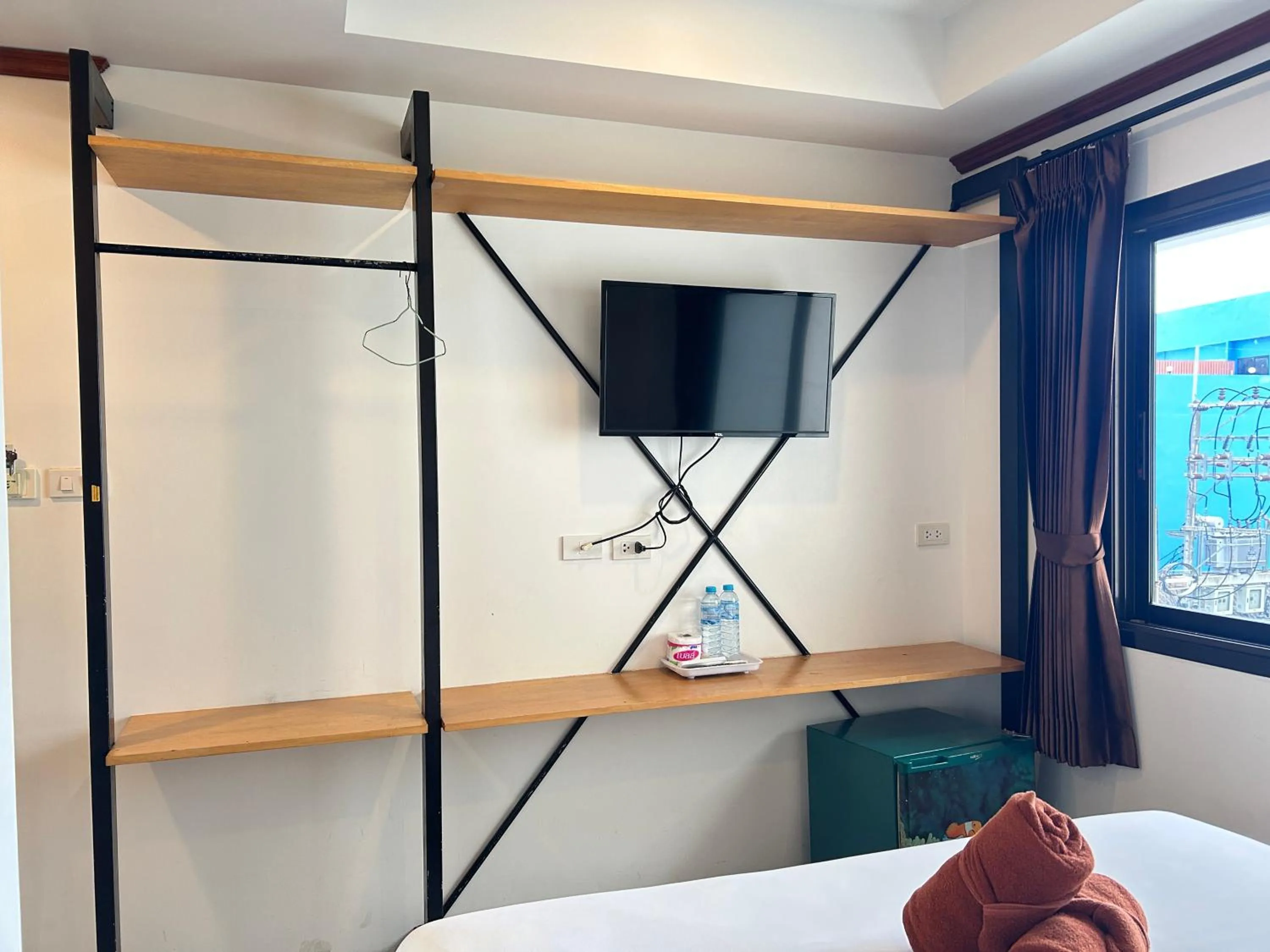 Bed in Coconut Grove Hotel Samui