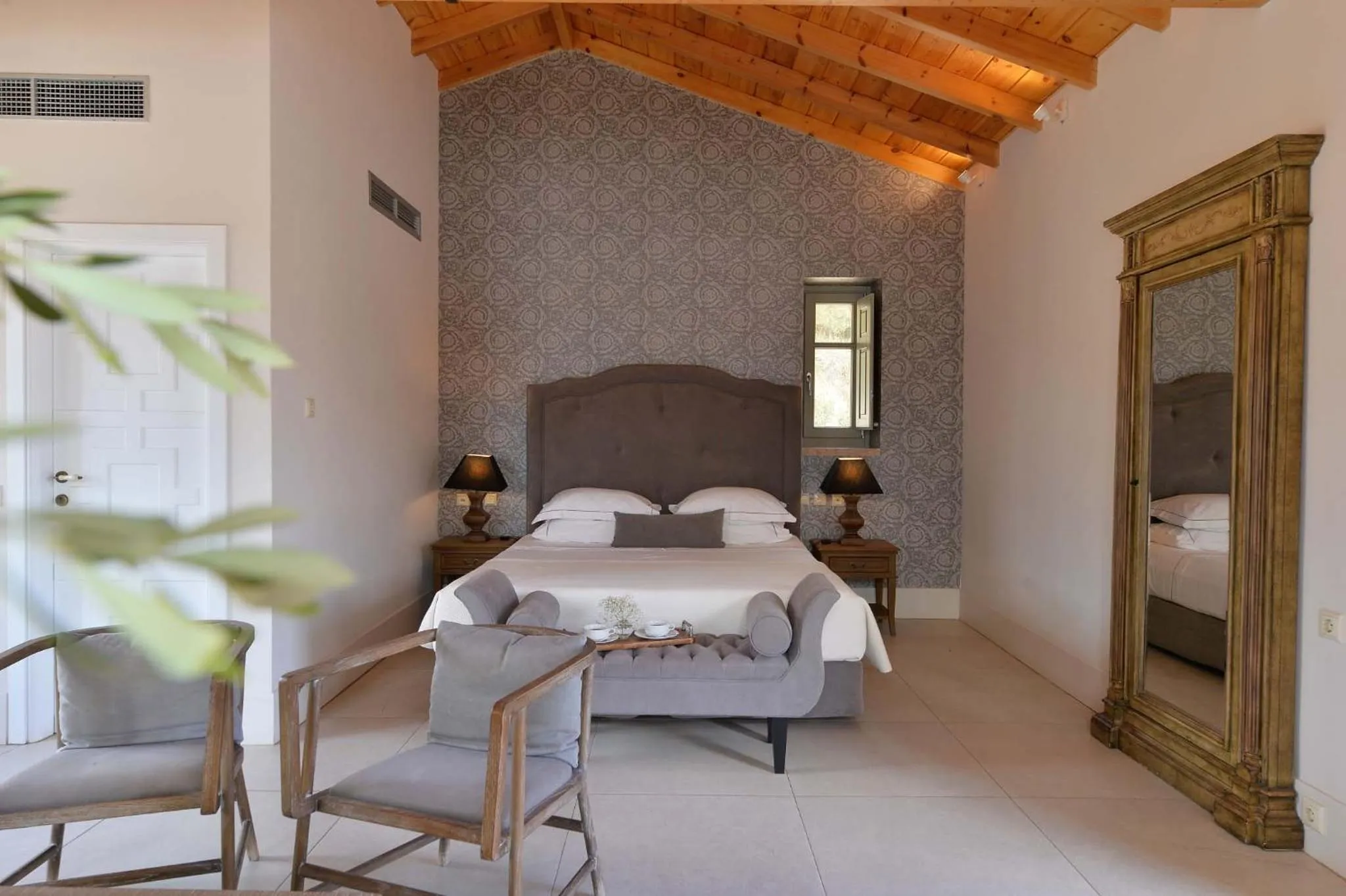 Photo of the whole room, Bed in Akrolithi Boutique Hotel & Suites