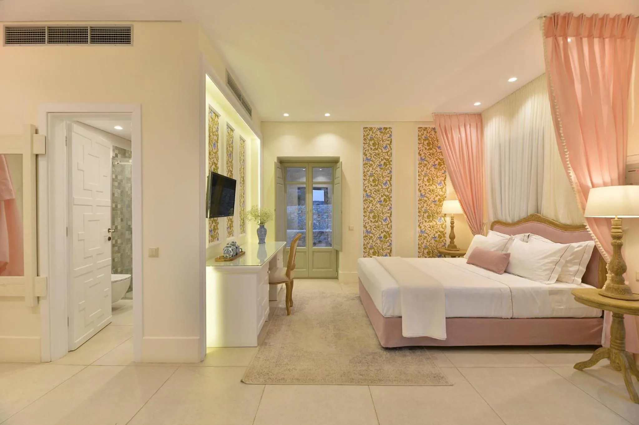 Bed in Akrolithi Boutique Hotel & Suites