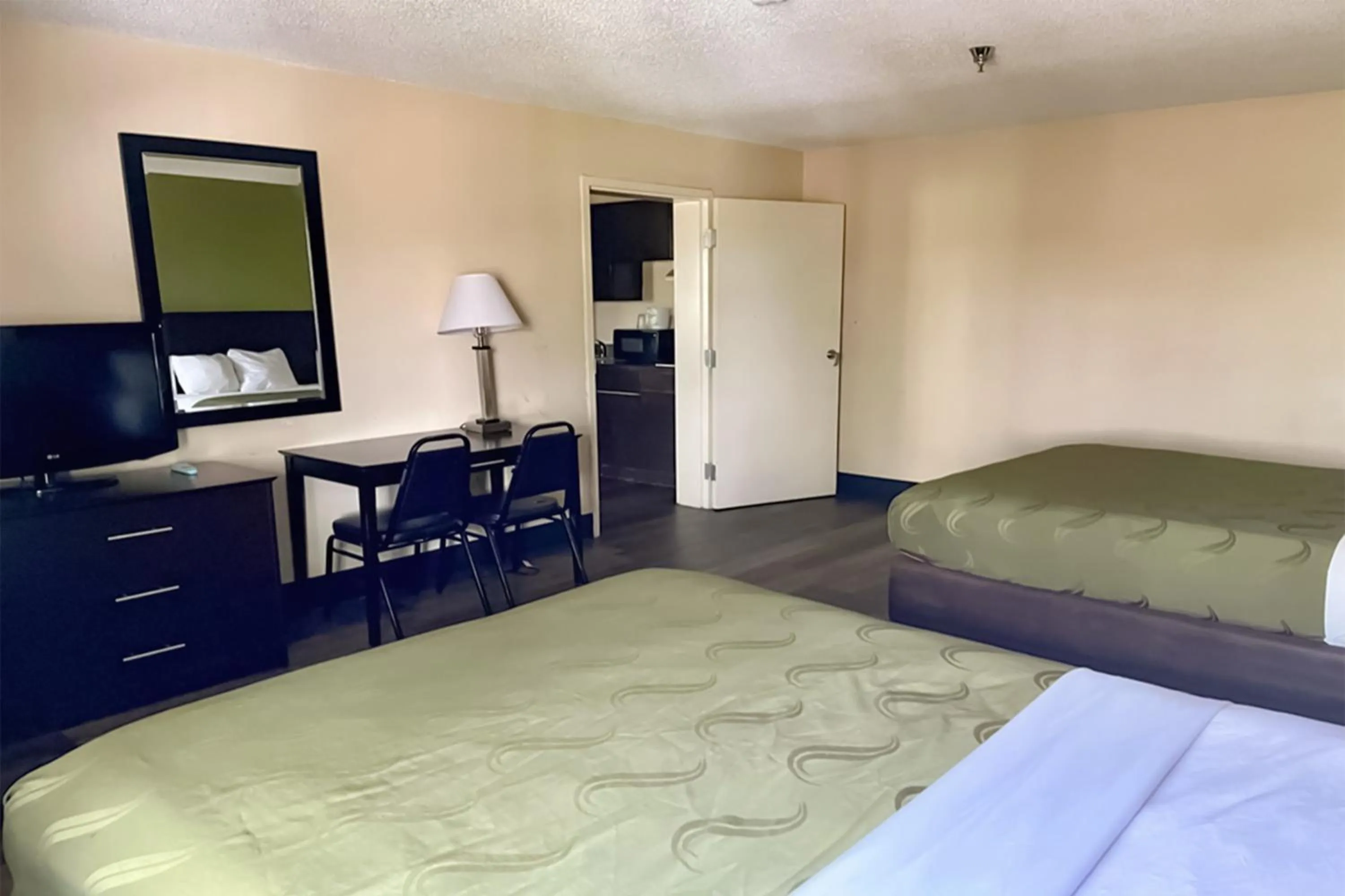 Bed, TV/Entertainment Center in Suburban Studios