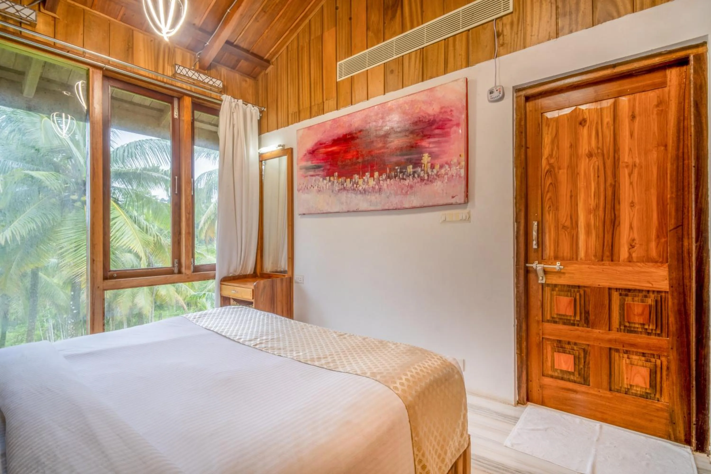 Bed in Rainforest Resort