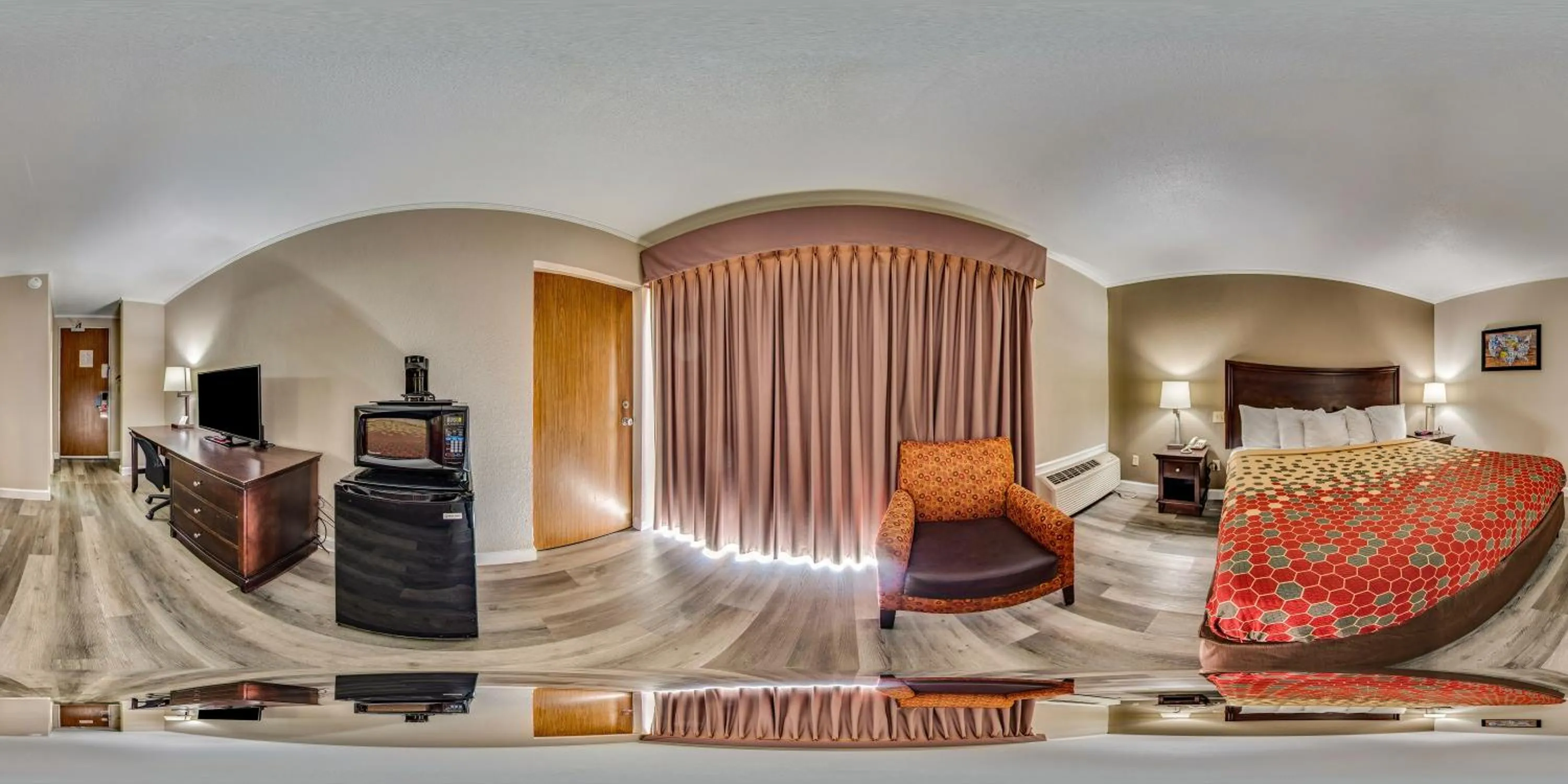 Bedroom in Perry Inn & Suites By Capital O National Fairground GA I 75