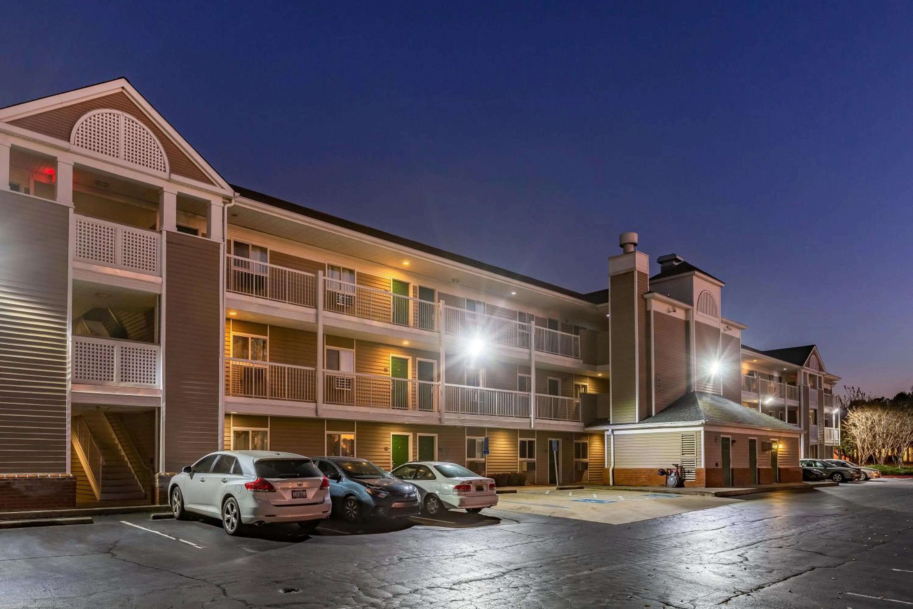 Property building in HomeTowne Studios by Red Roof Atlanta - Chamblee