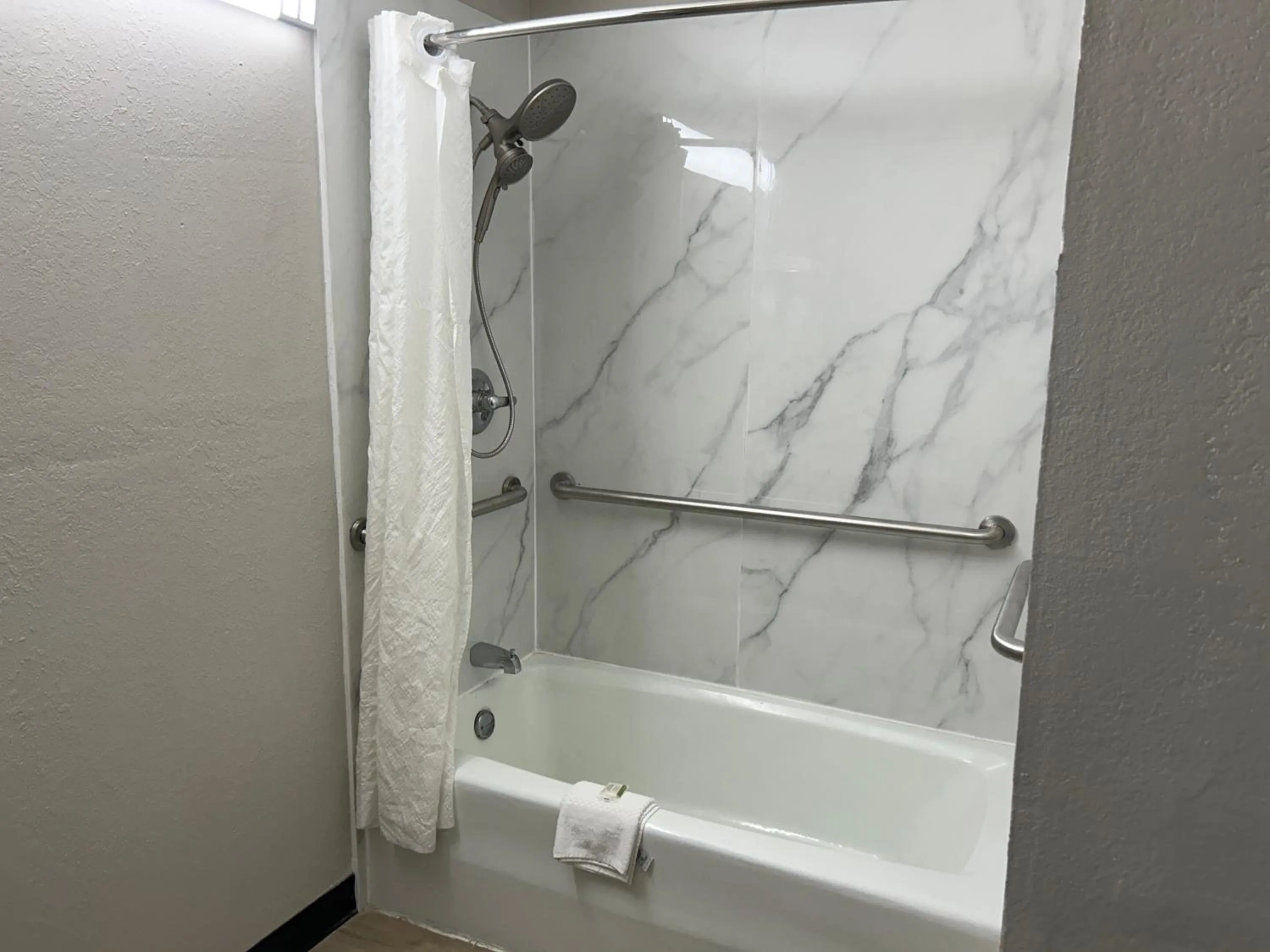 Bathroom in Days Inn by Wyndham Hinesville Near Fort Stewart, Newly Renovated, Free Hot Breakfast, Restaurant and Bar