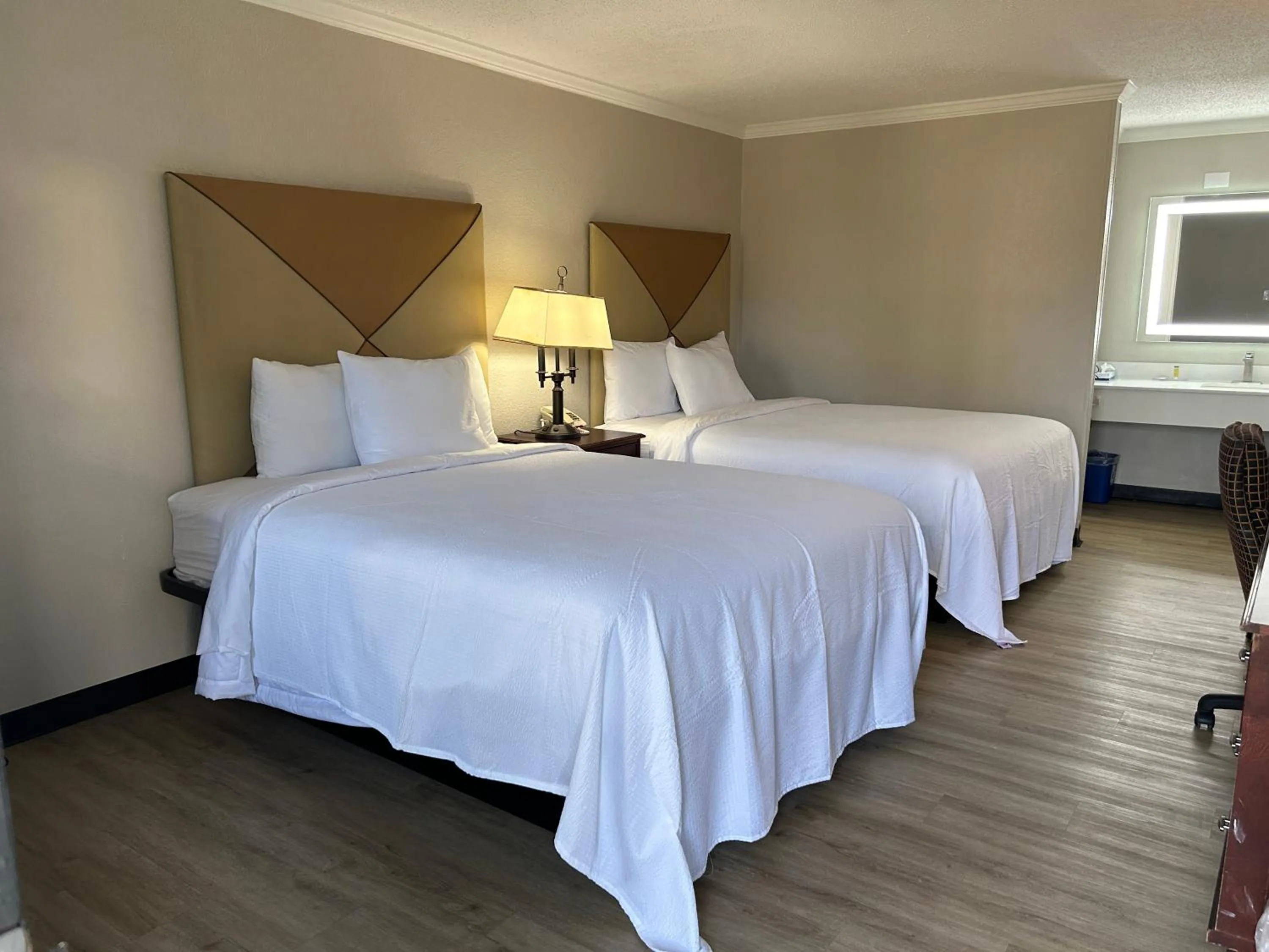 Photo of the whole room, Bed in Days Inn by Wyndham Hinesville Near Fort Stewart, Newly Renovated, Free Hot Breakfast, Restaurant and Bar