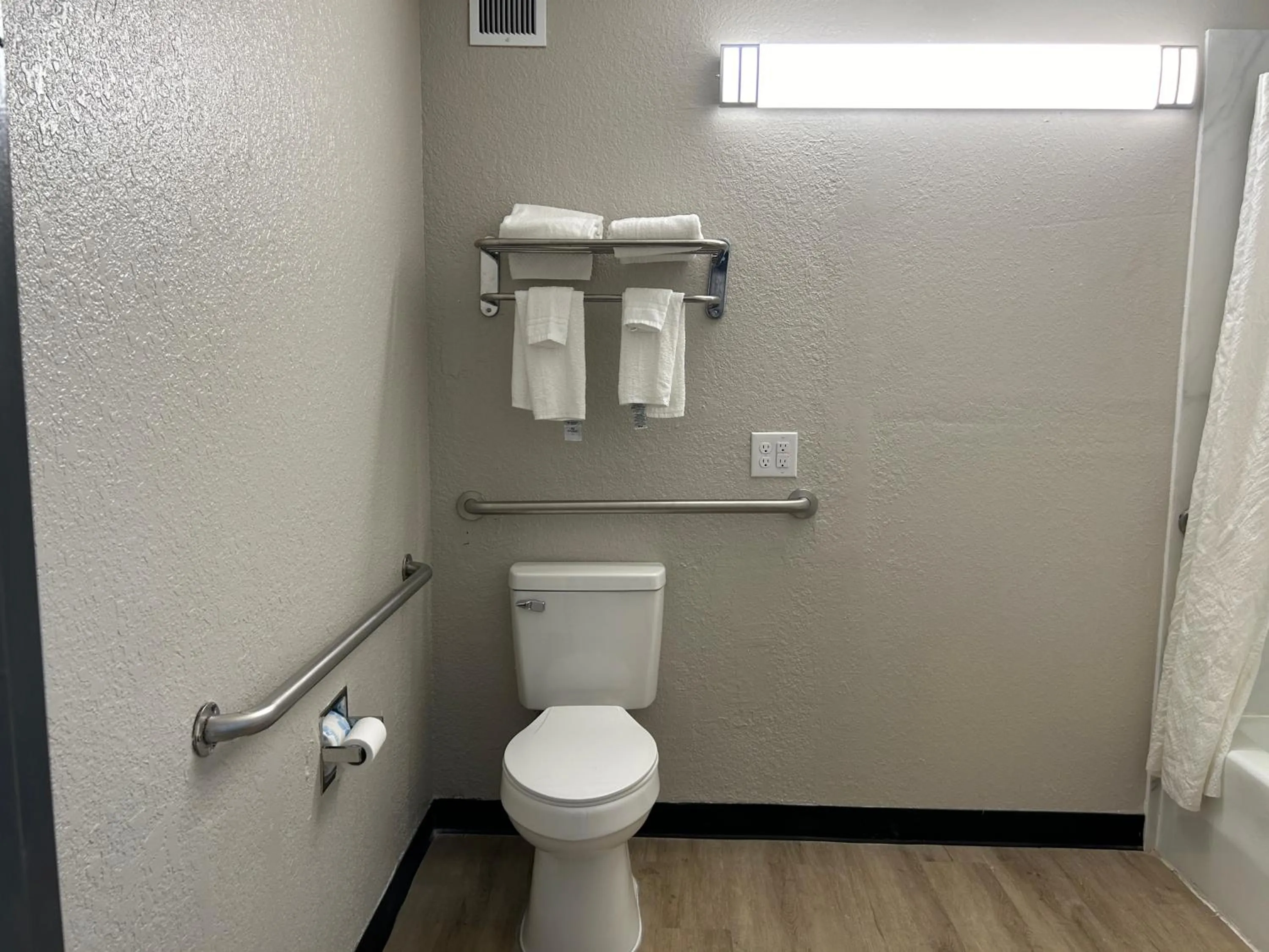 Toilet in Days Inn by Wyndham Hinesville Near Fort Stewart, Newly Renovated, Free Hot Breakfast, Restaurant and Bar