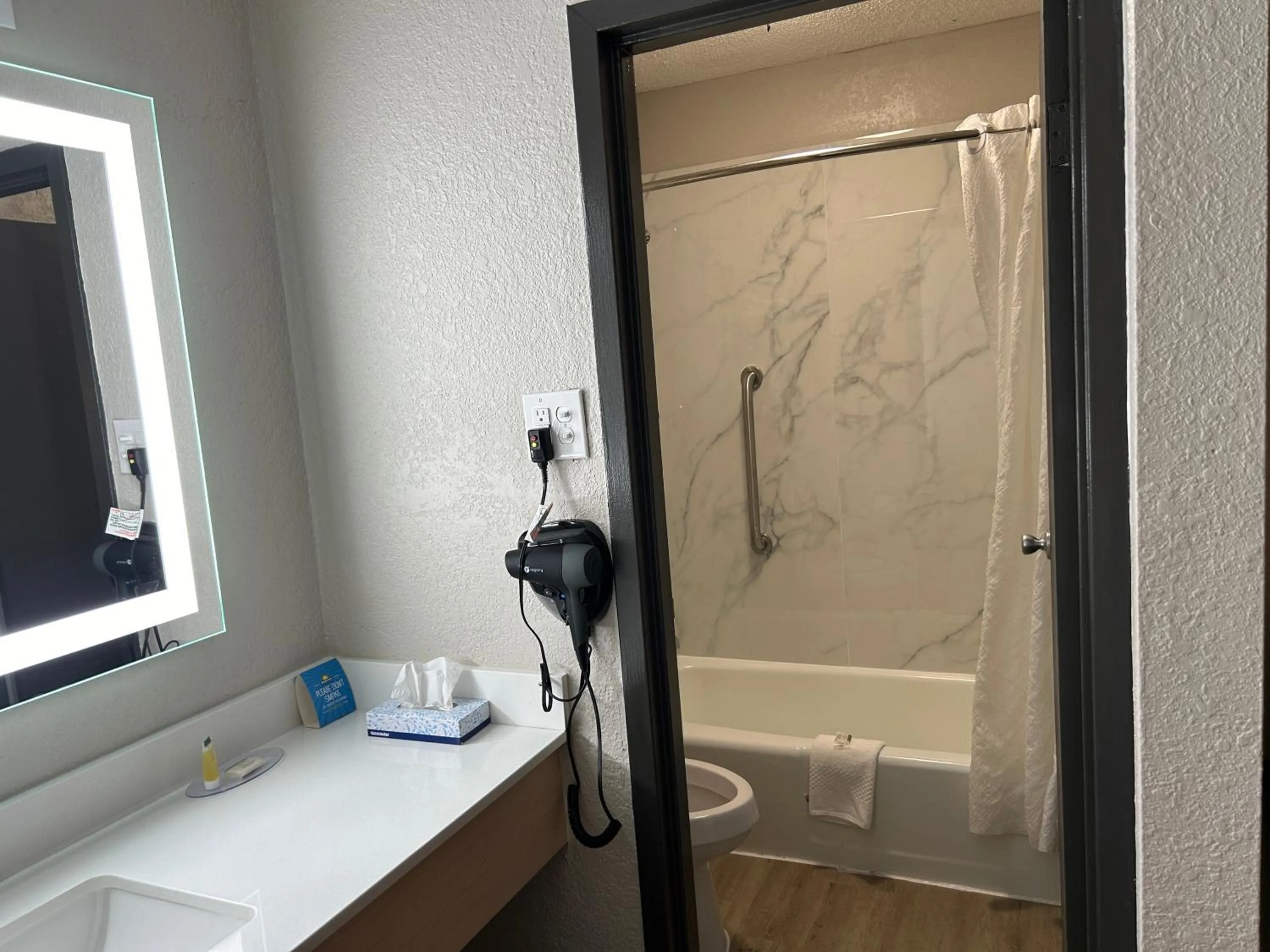 Bathroom in Days Inn by Wyndham Hinesville Near Fort Stewart, Newly Renovated, Free Hot Breakfast, Restaurant and Bar