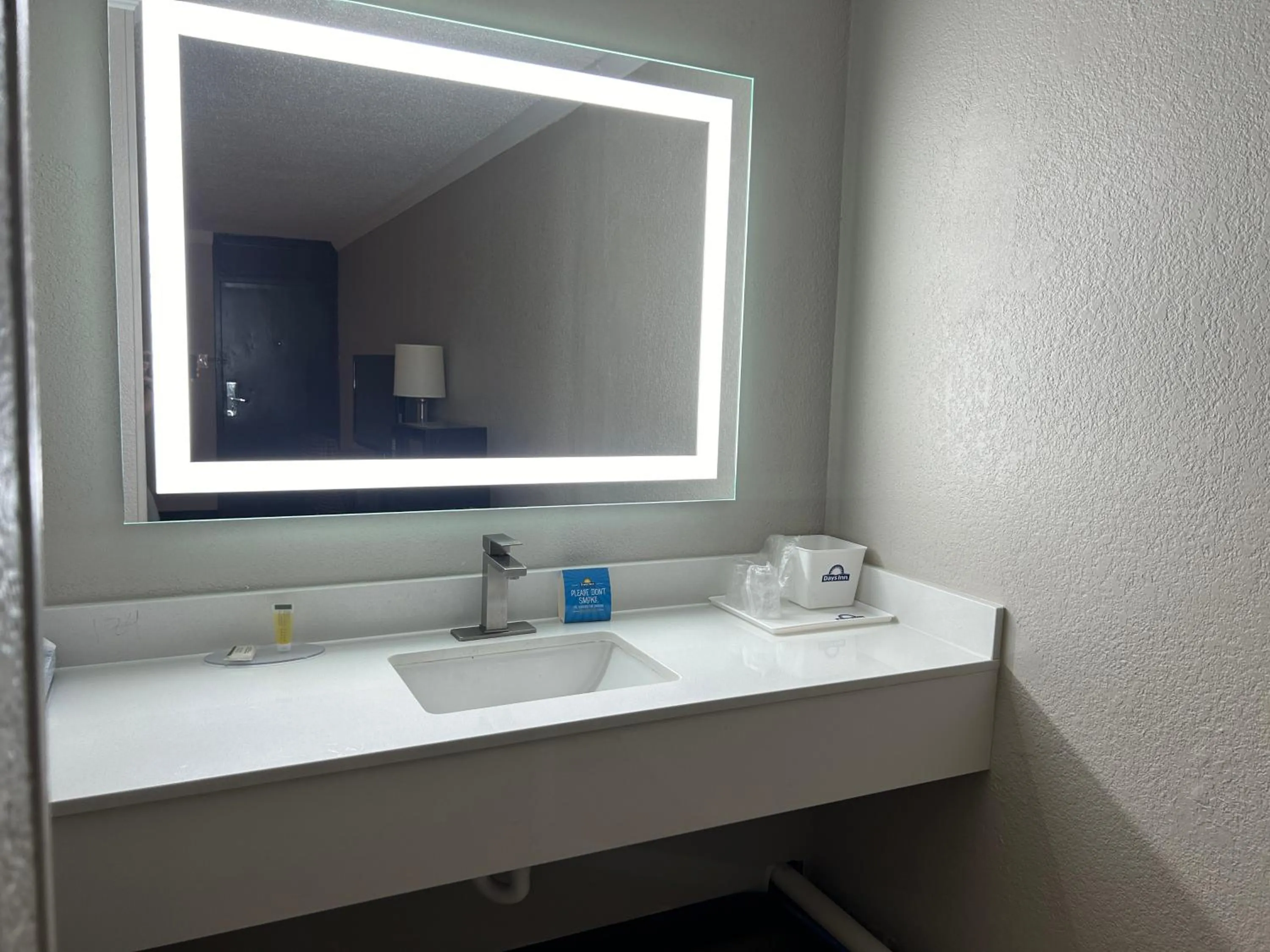 Bathroom in Days Inn by Wyndham Hinesville Near Fort Stewart, Newly Renovated, Free Hot Breakfast, Restaurant and Bar