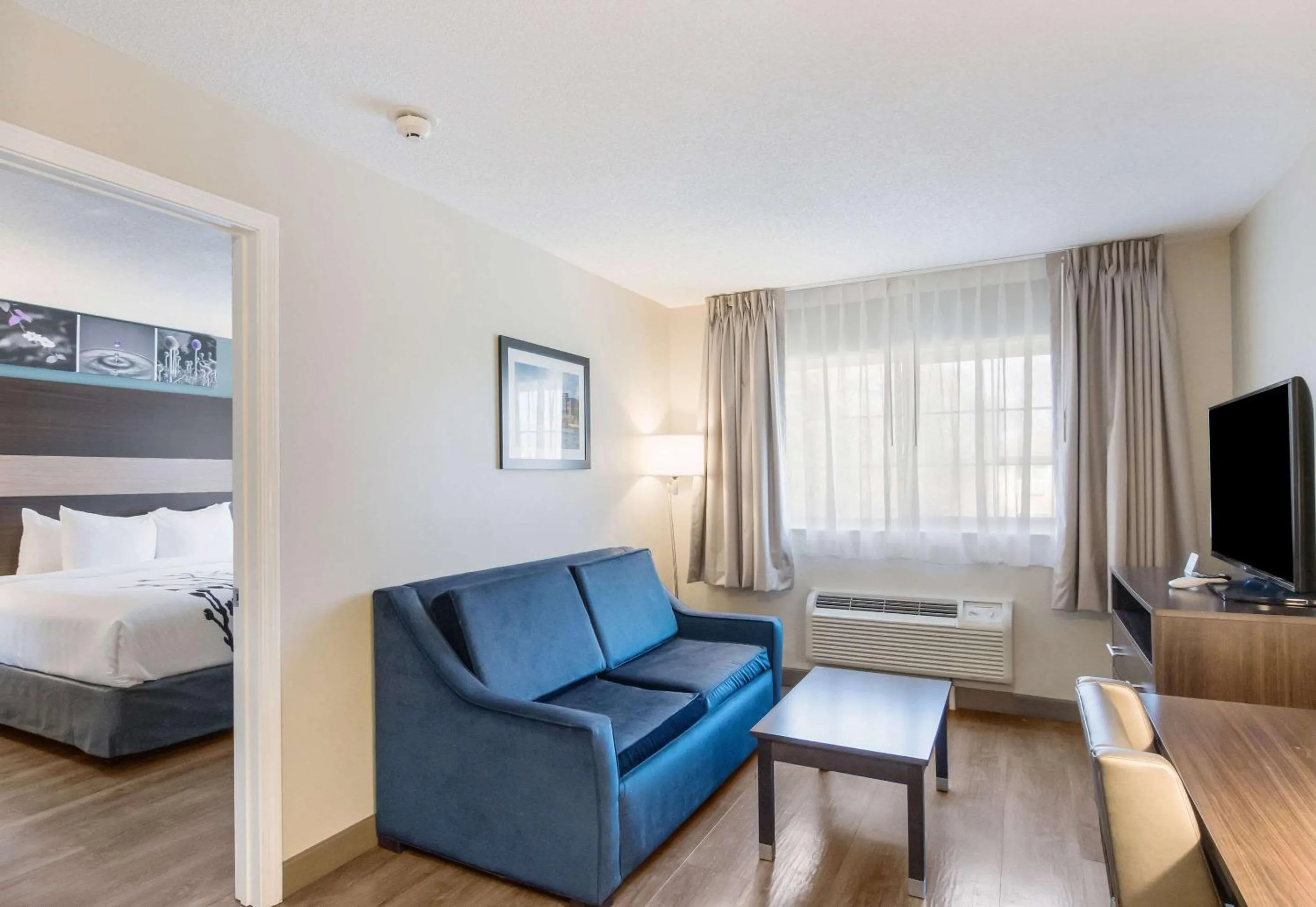 Living room, Bed in Sleep Inn & Suites Columbus near Fort Benning