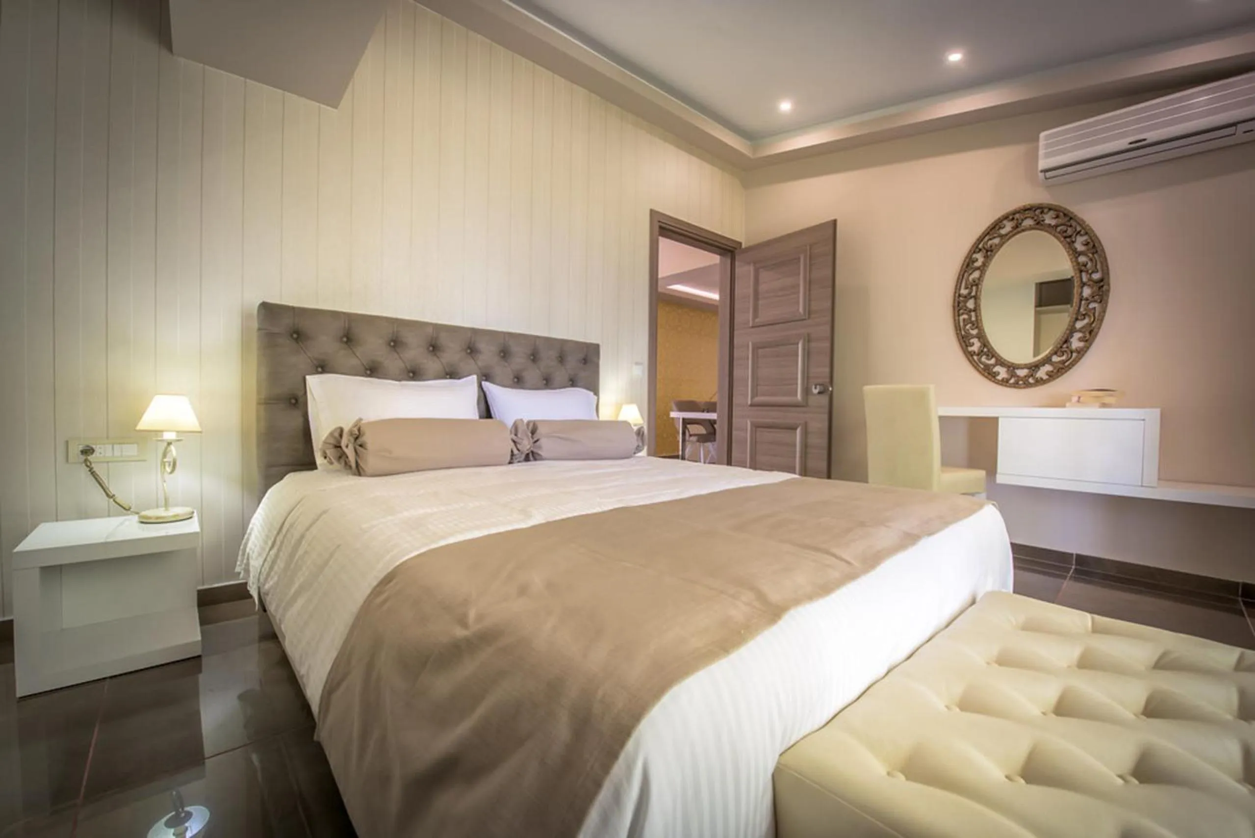 Photo of the whole room, Bed in Koukounaria Hotel & Suites