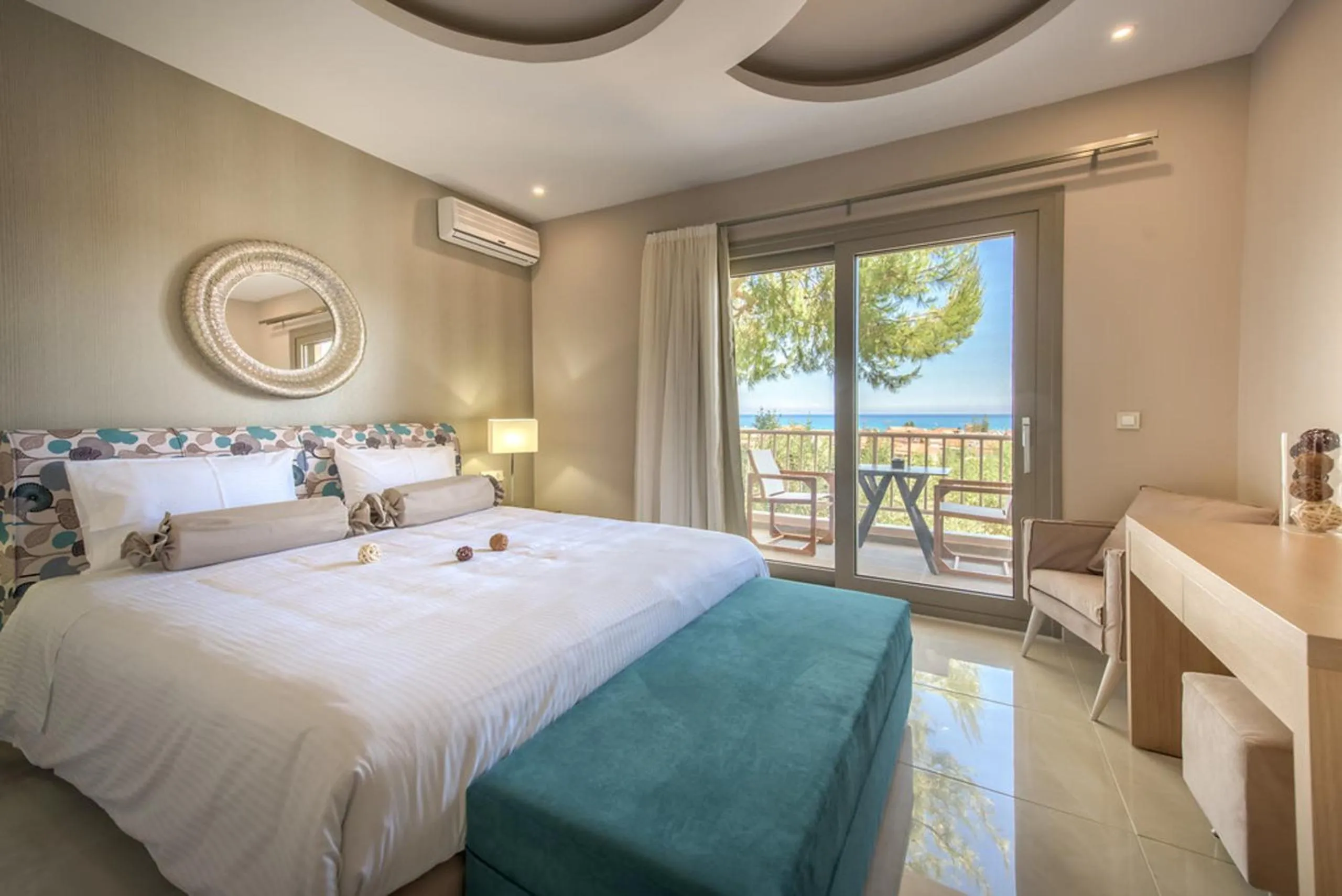 Bed in Koukounaria Hotel & Suites