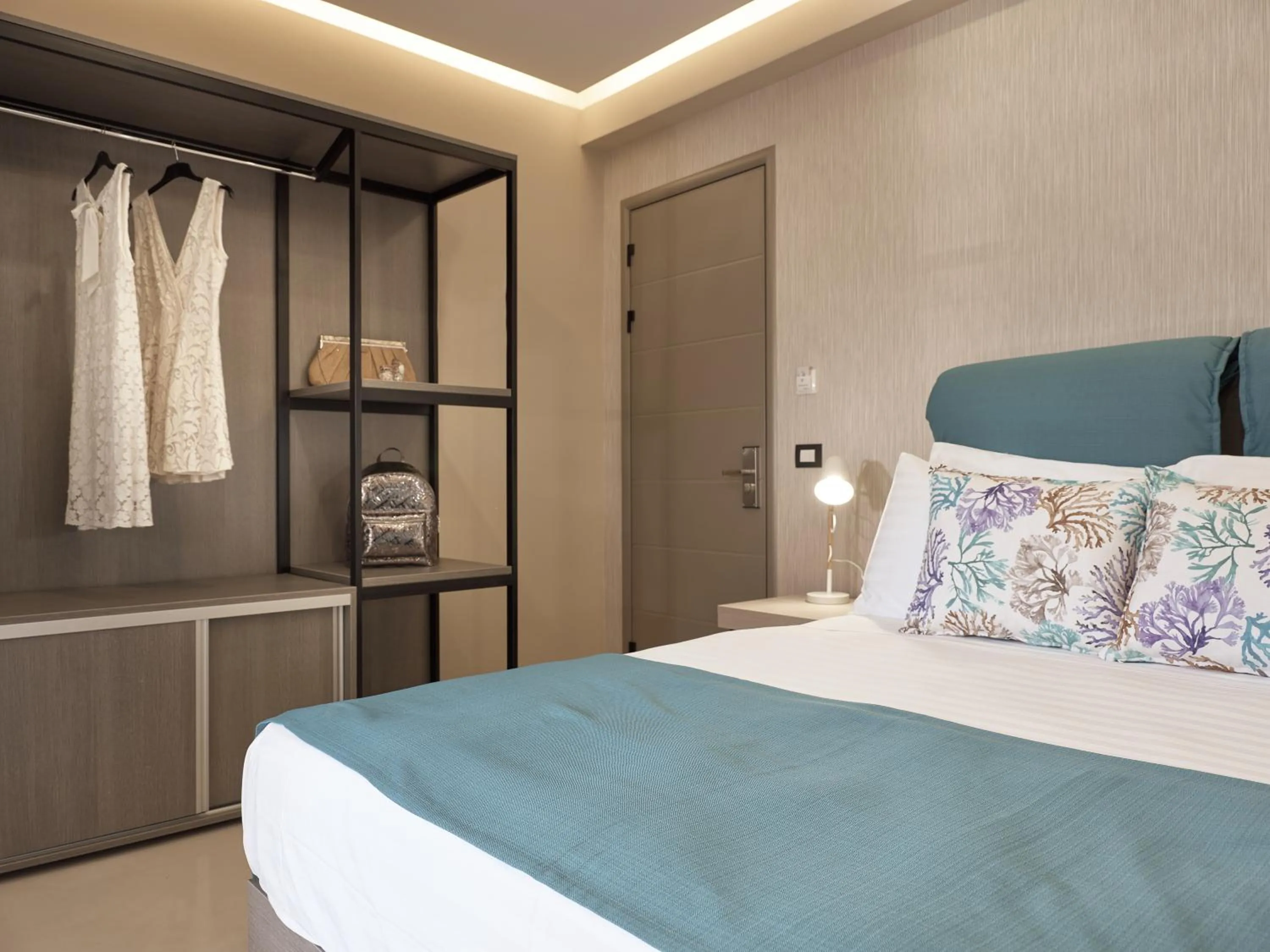 Bed in Koukounaria Hotel & Suites