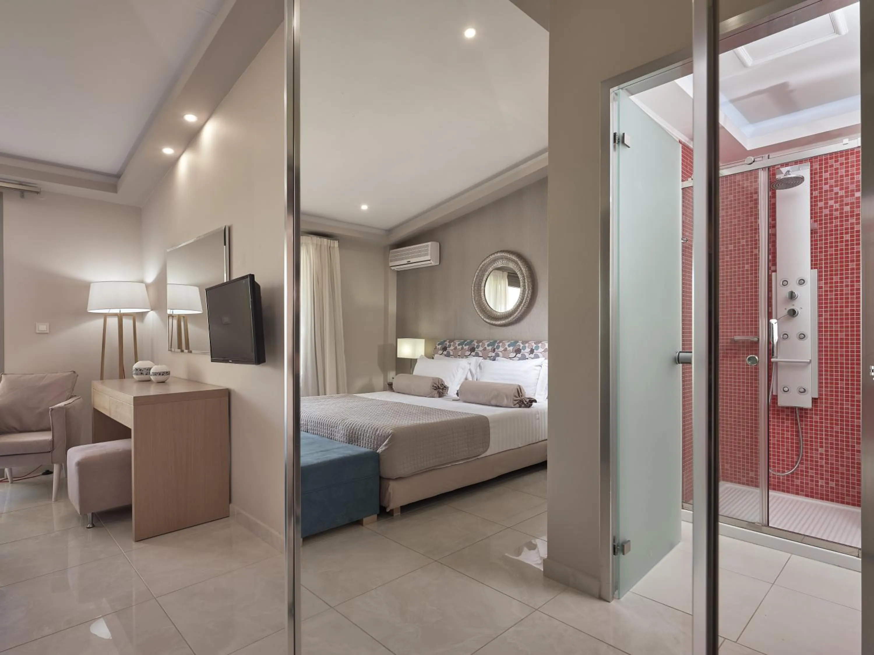 Bed in Koukounaria Hotel & Suites