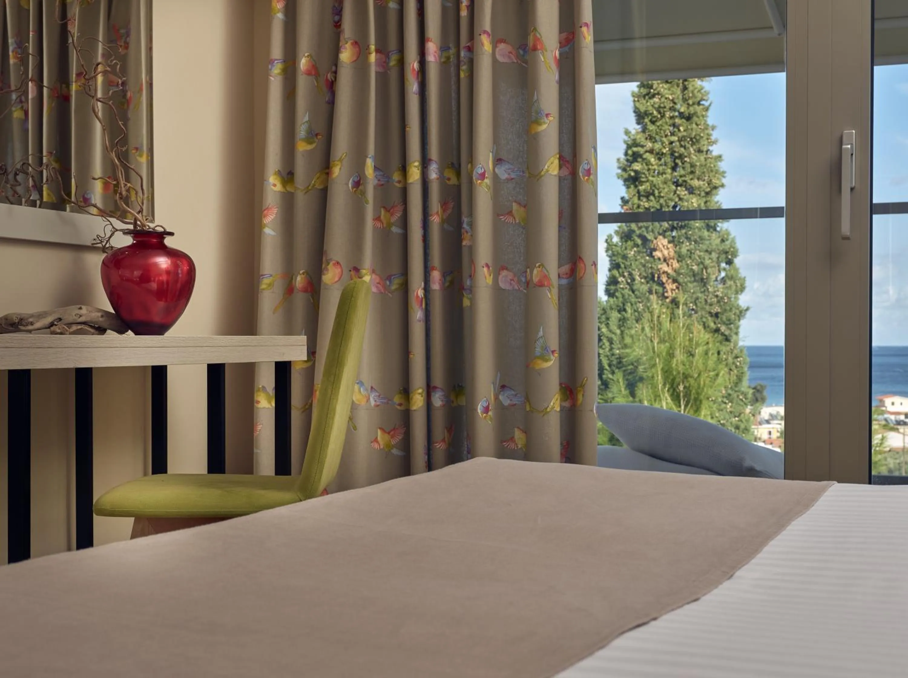 Bed in Koukounaria Hotel & Suites