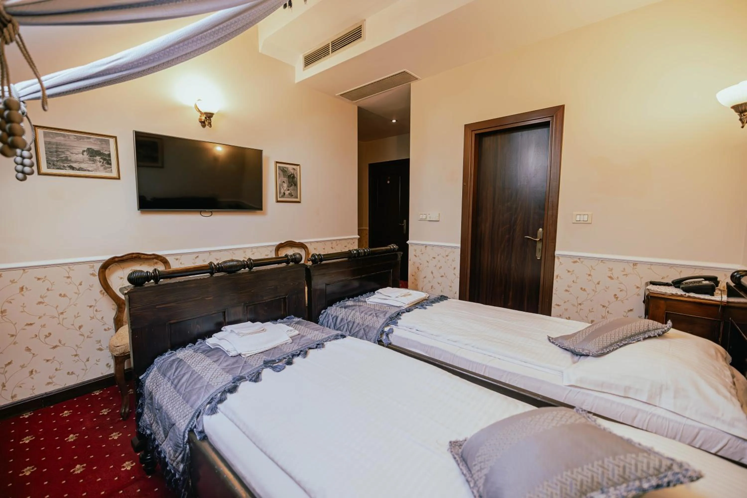 Bed in Casa del Sole Boutique Hotel Timisoara