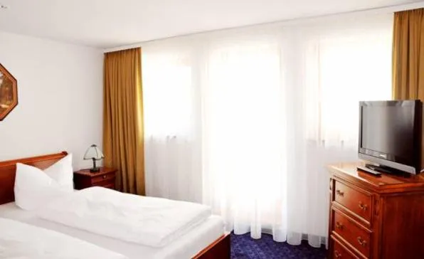 TV and multimedia, Bed in Fürstenhof Wernigerode Garni