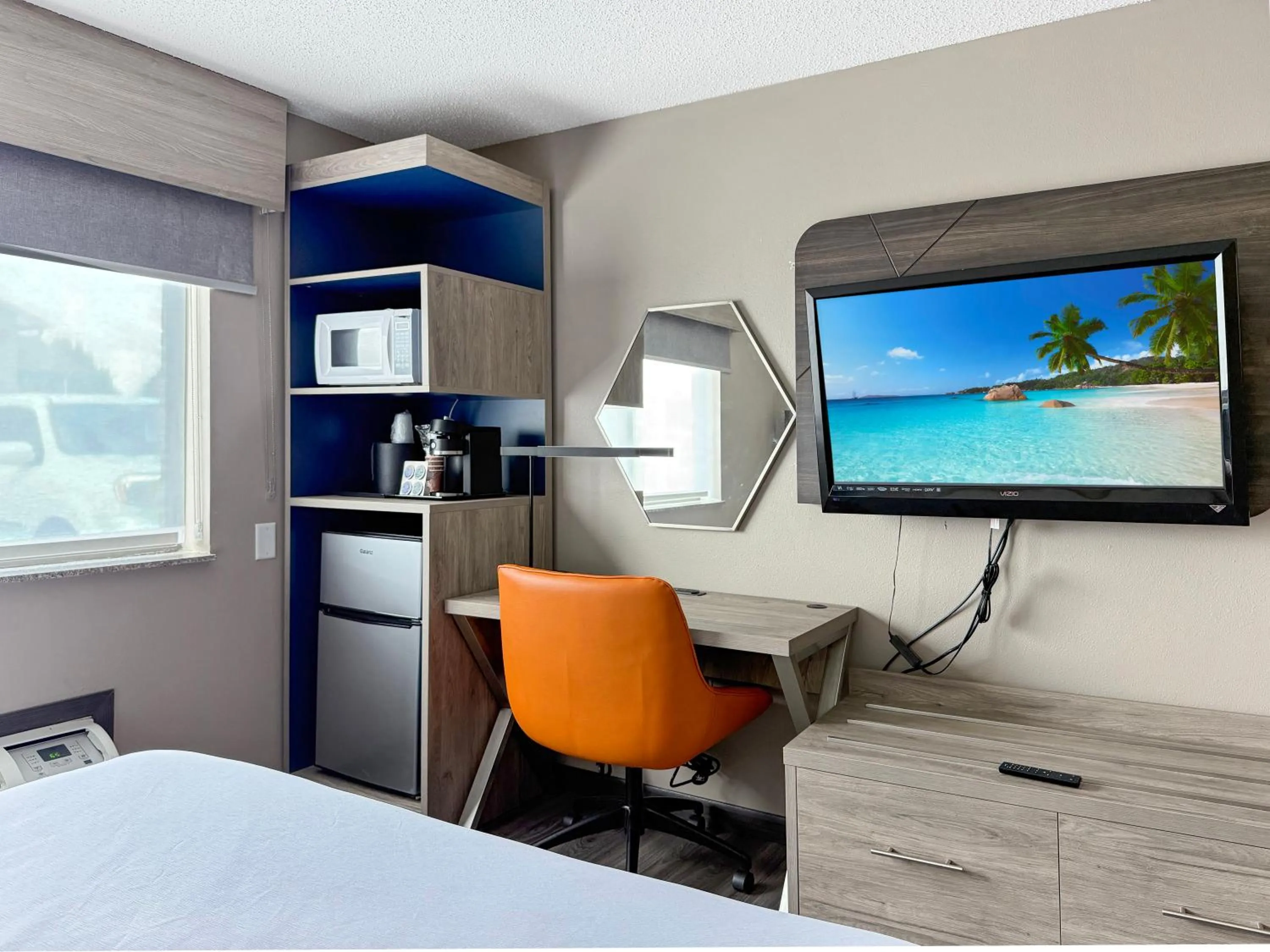 Bed in Reston Inn & Suites