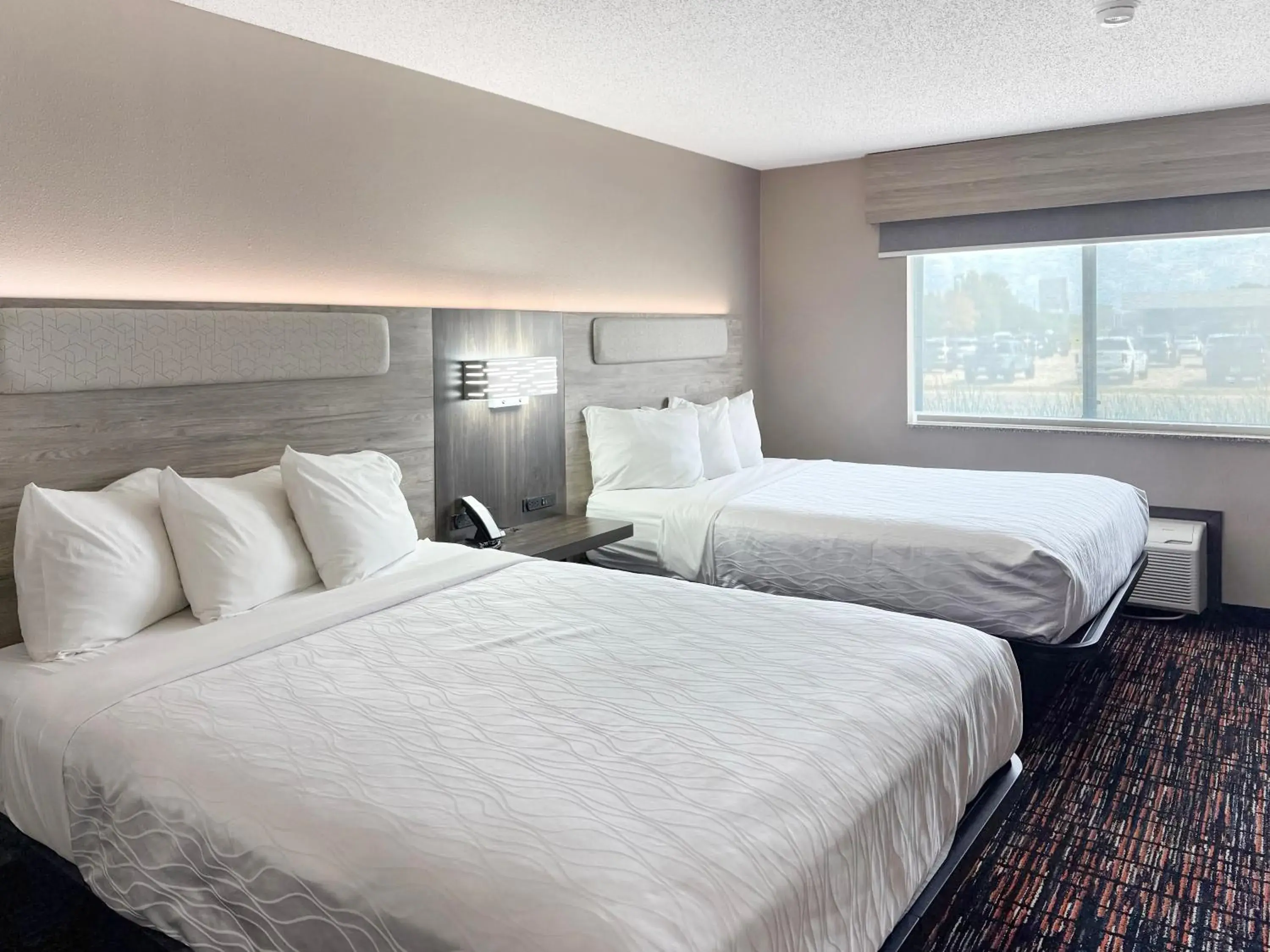 Deluxe Queen Room with Two Queen Beds in Reston Inn & Suites Deluxe Queen Room with Two Queen Beds in Reston Inn & Suites