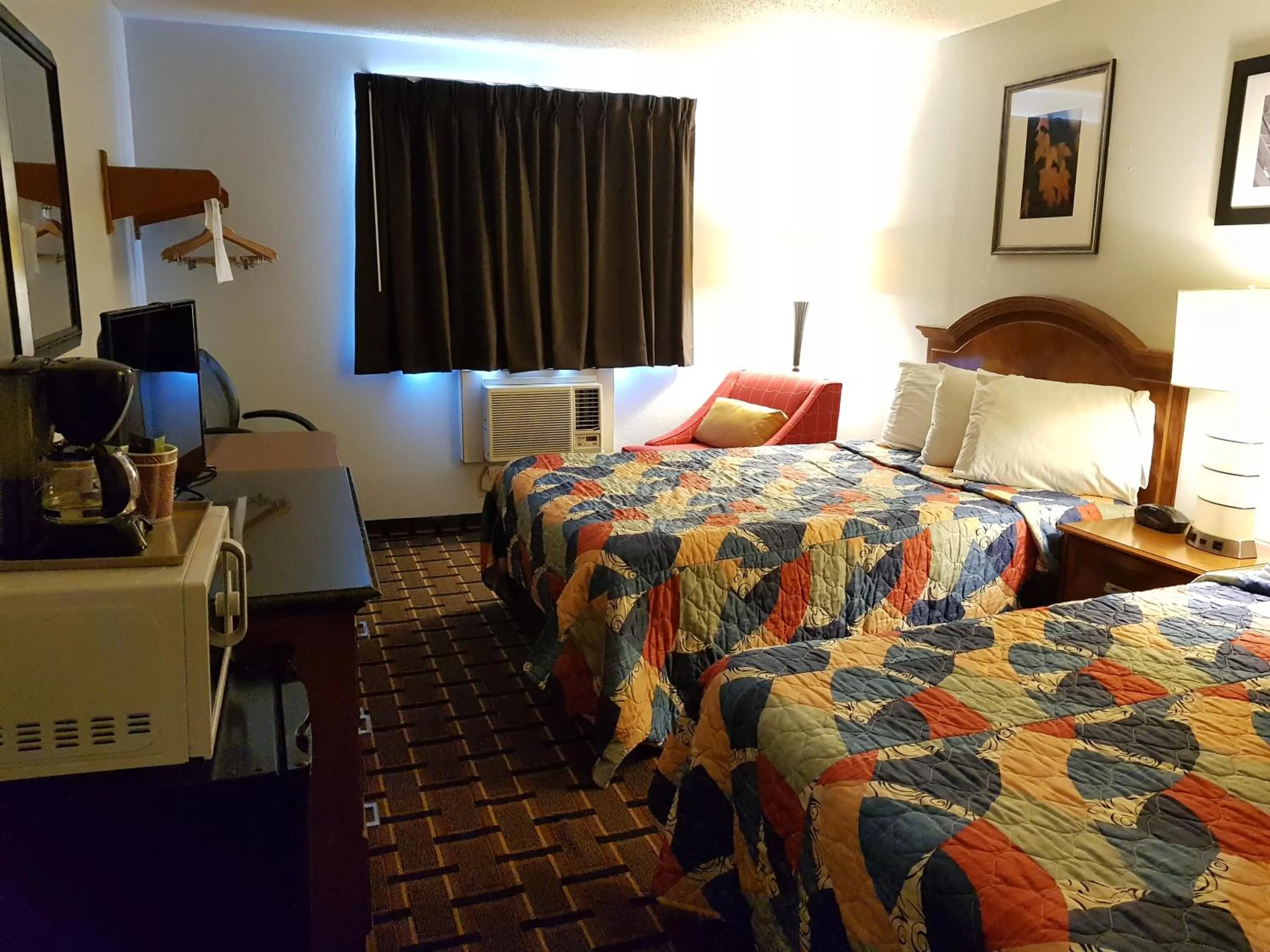 Bed in Le Mars Inn and Suites