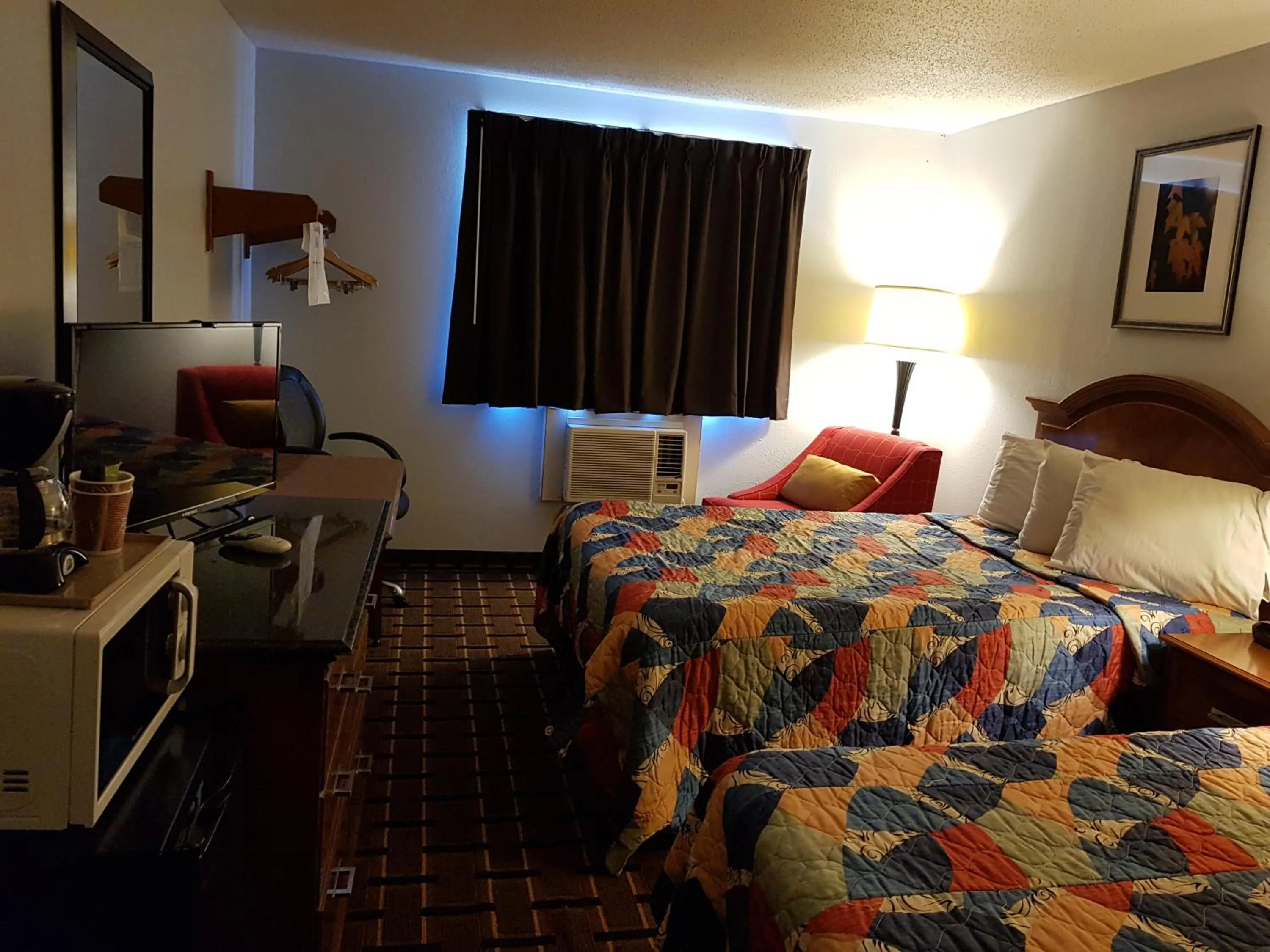 Bed in Le Mars Inn and Suites
