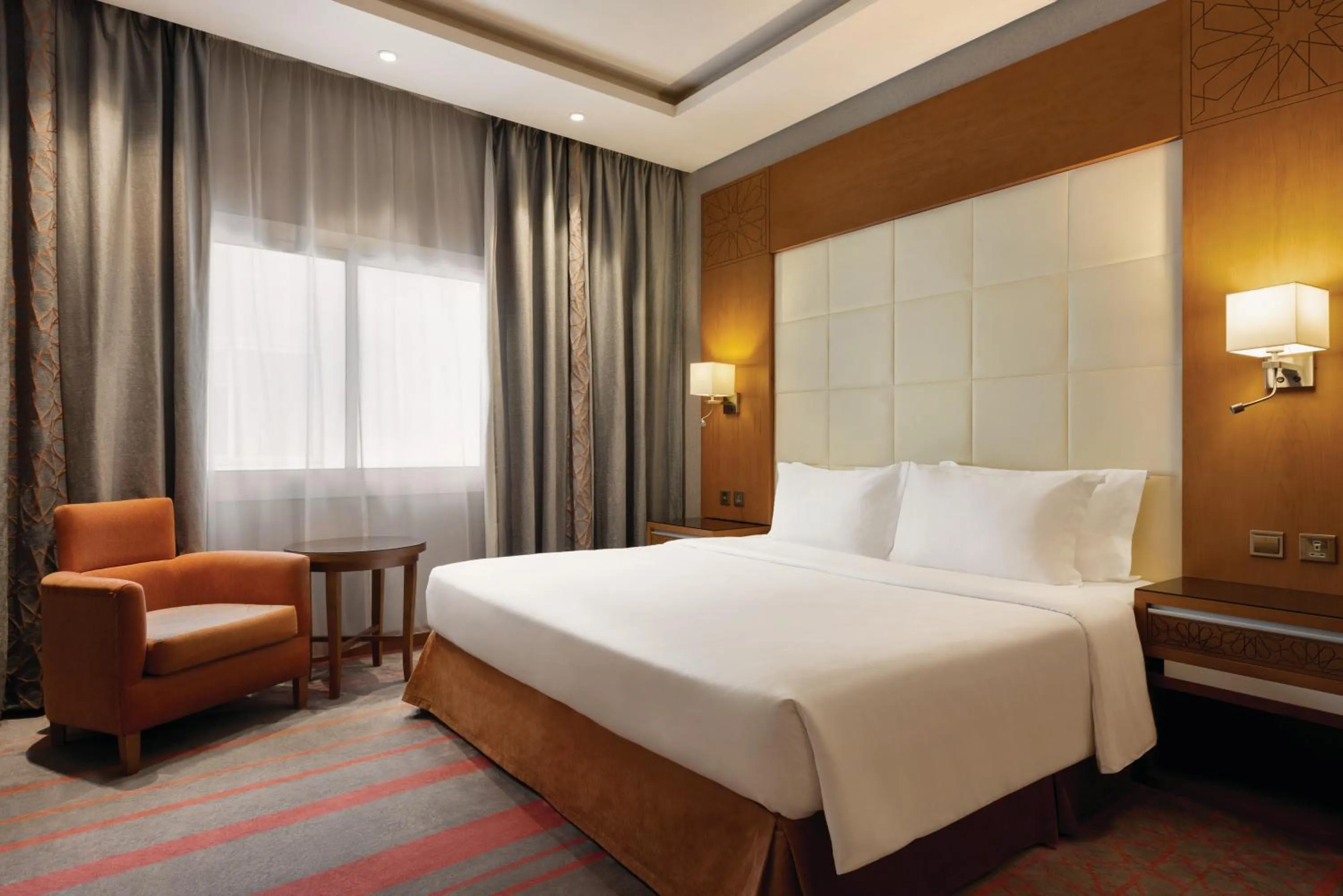 Bed in Vivid Jeddah Hotel, a member of Radisson Individuals