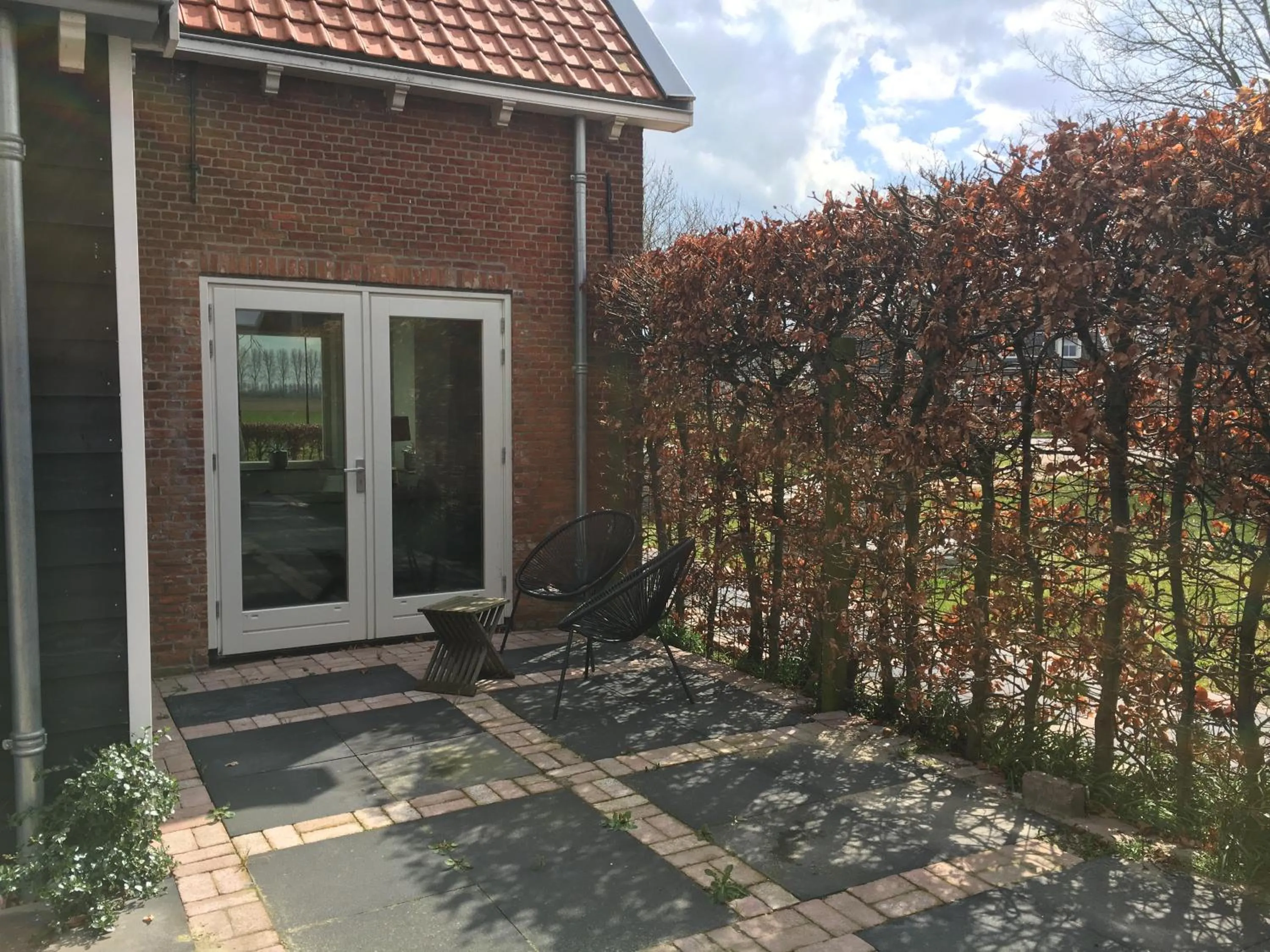 Patio in B&B Boerderij De Vaete - Duurzaam genieten in de zak van Zuid-Beveland