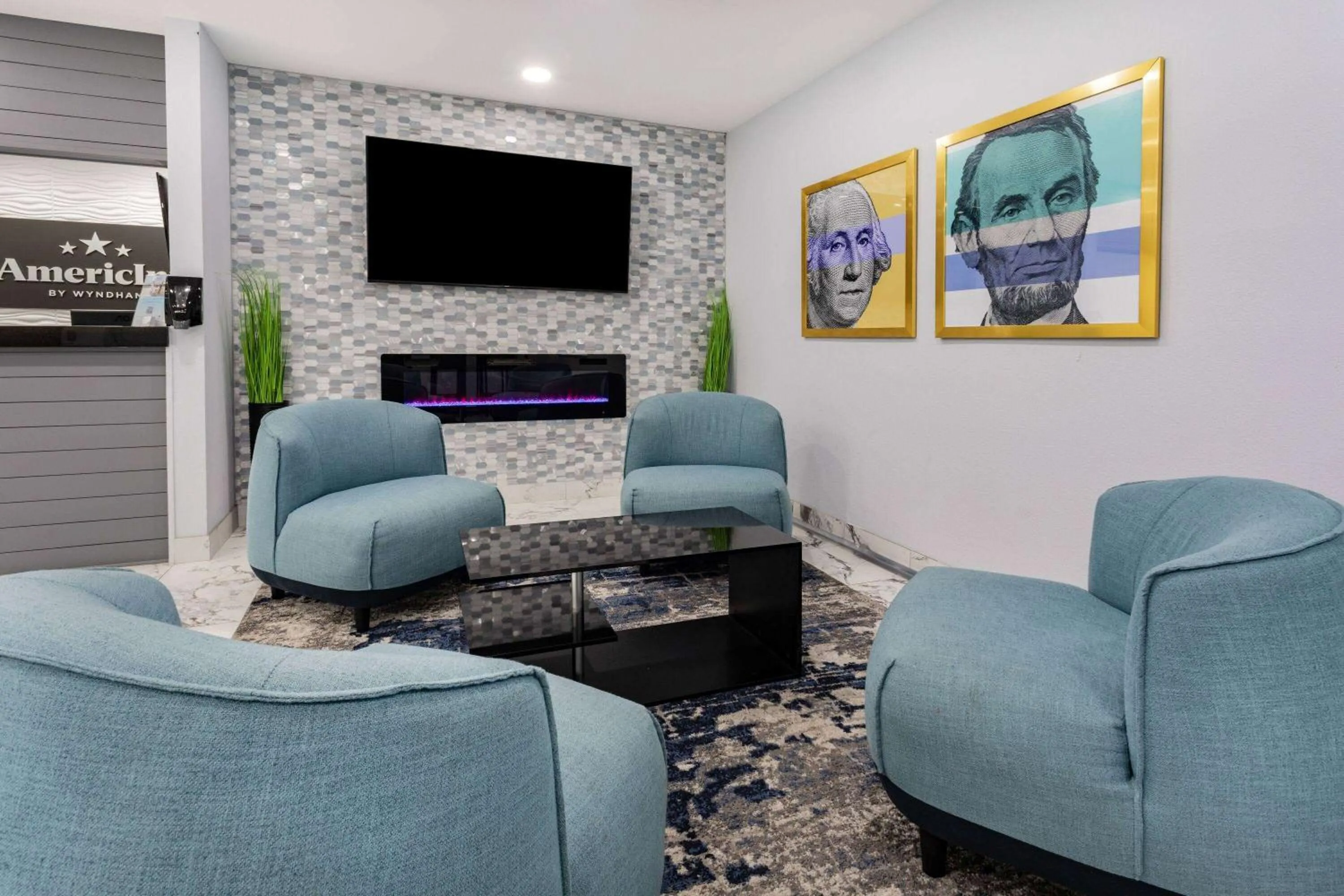 Lobby or reception in AmericInn by Wyndham Quincy