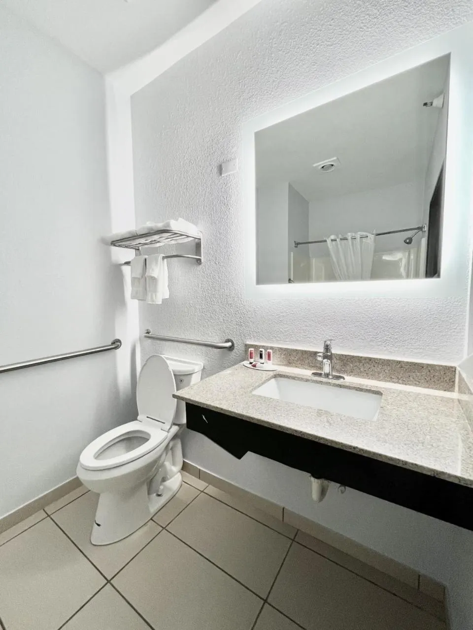 Bathroom in AmericInn by Wyndham Quincy