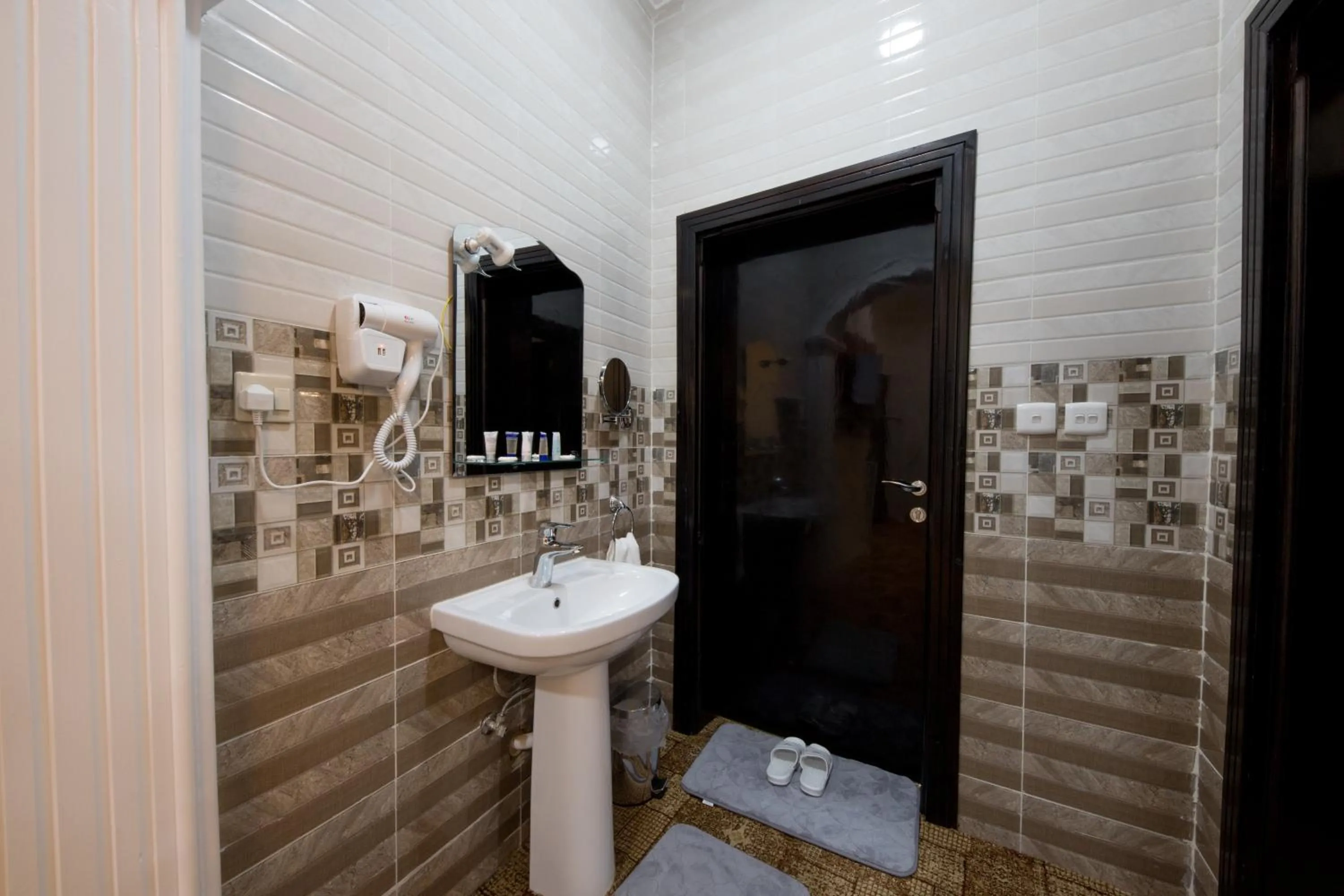 Shower in Jasmine Beach Hotel Suites