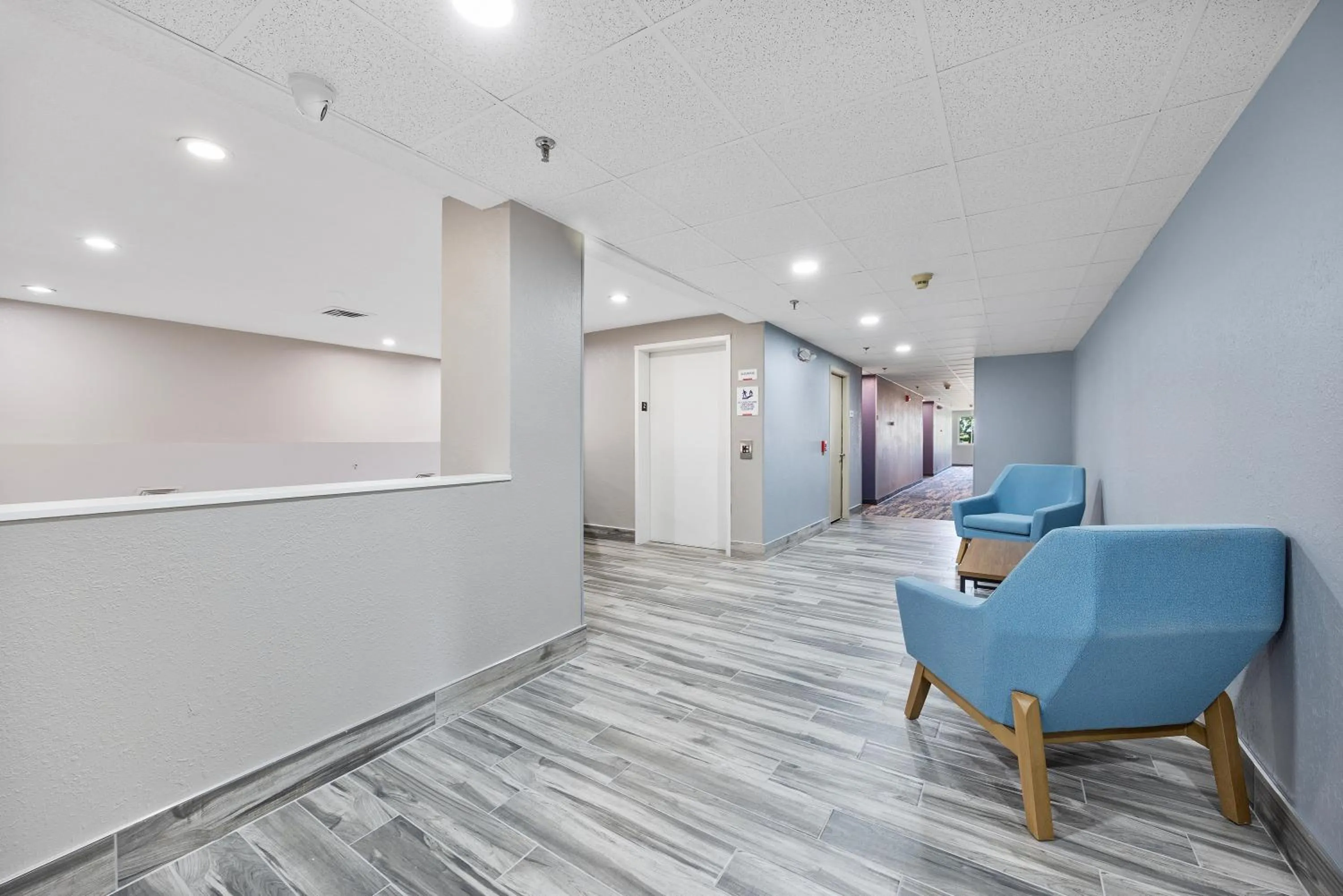 Seating area in AmericInn by Wyndham Urbana Champaign University Area