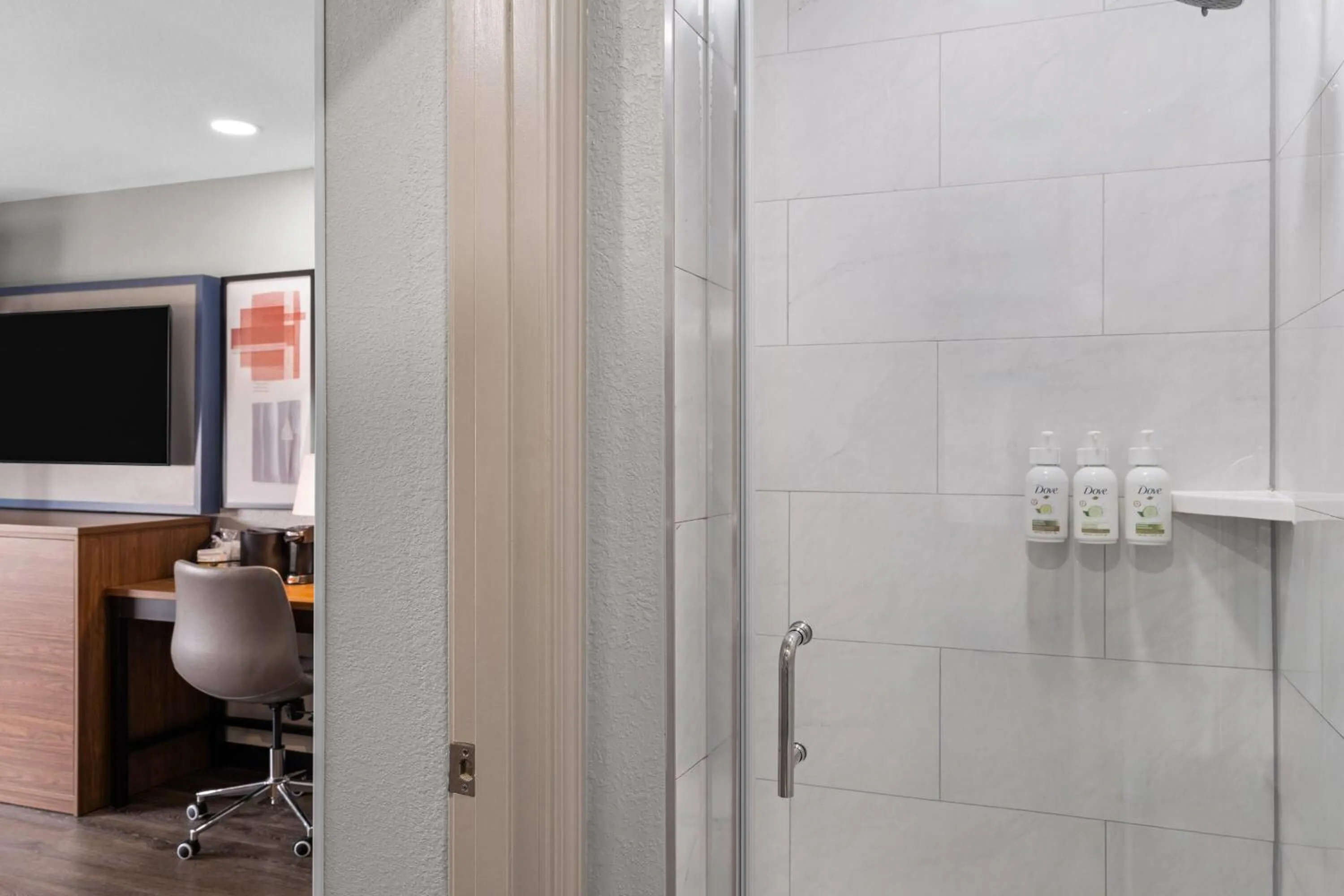 Bathroom in AmericInn by Wyndham Urbana Champaign University Area