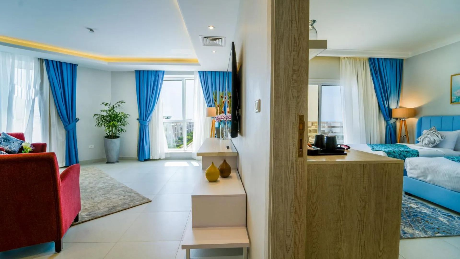 Living room, Bed in SeaVille Beach Hotel by Elite Hotels & Resorts