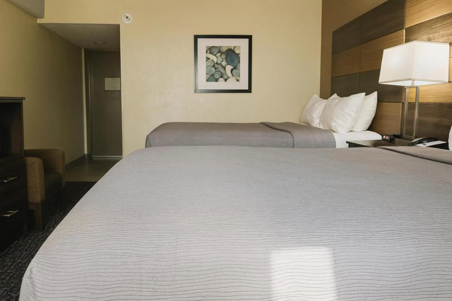 Bed in Quality Inn and Conference Center