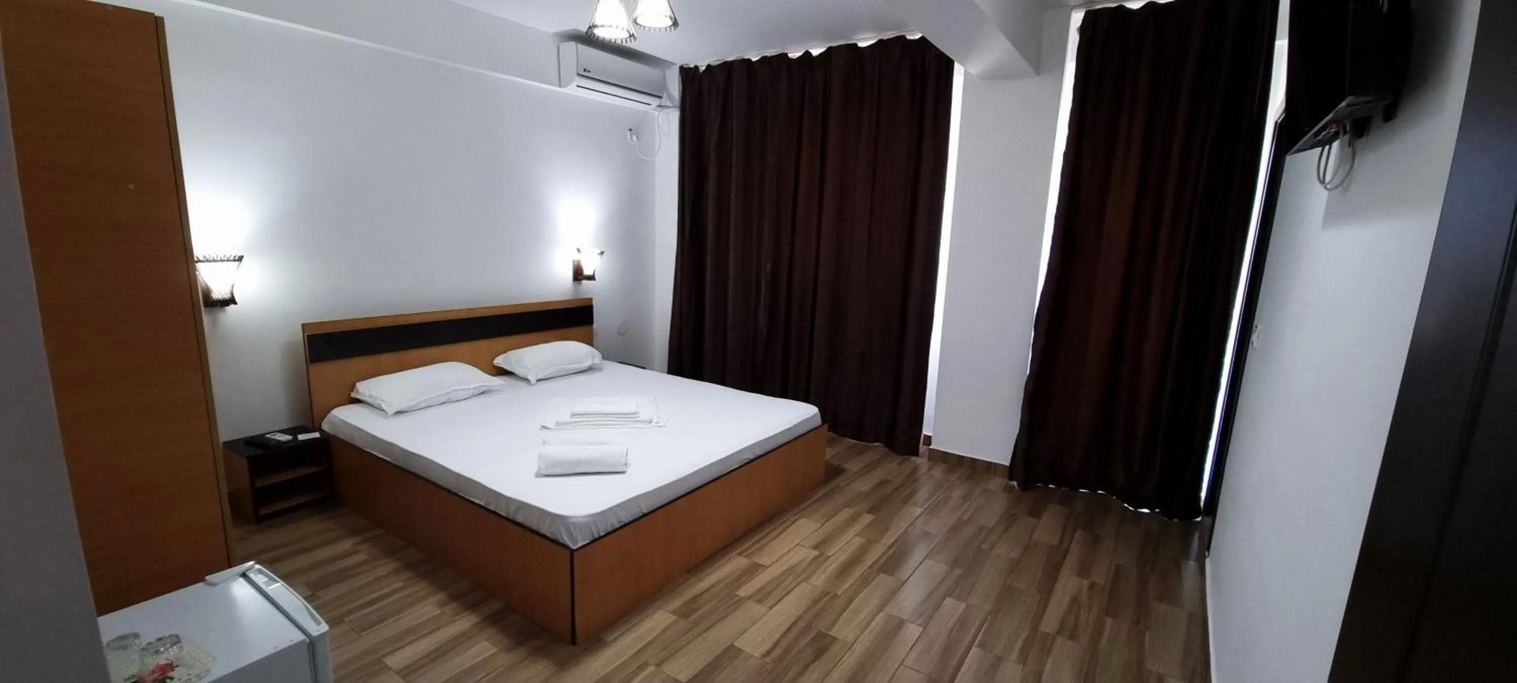 Bed in Hotel Blue Sky Resort