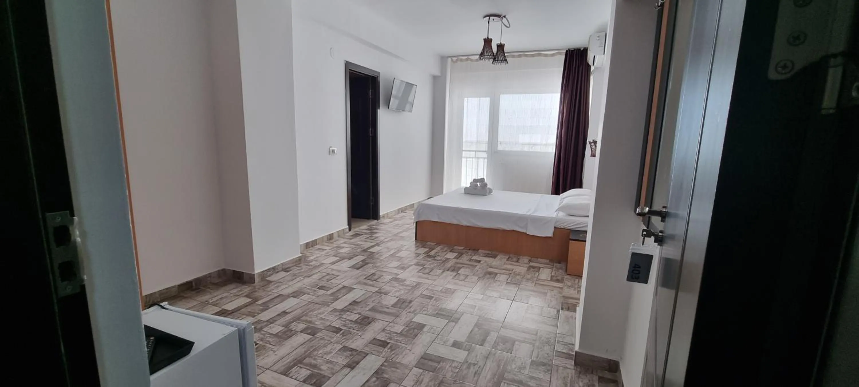 Bed in Hotel Blue Sky Resort